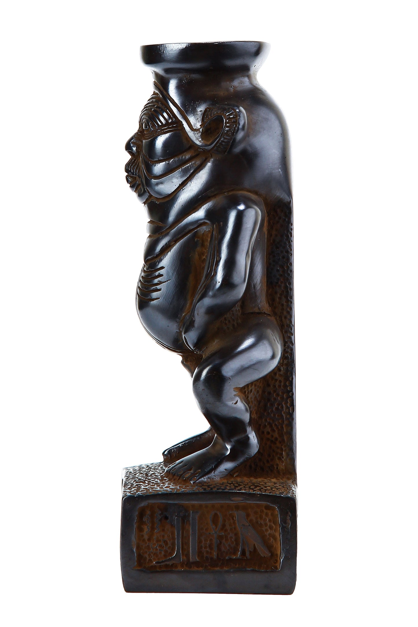 Ancient Egyptian statue of Bes, represented as a dwarf with large head, goggle eyes, protruding tongue, bowlegs, bushy tail made in Egypt
