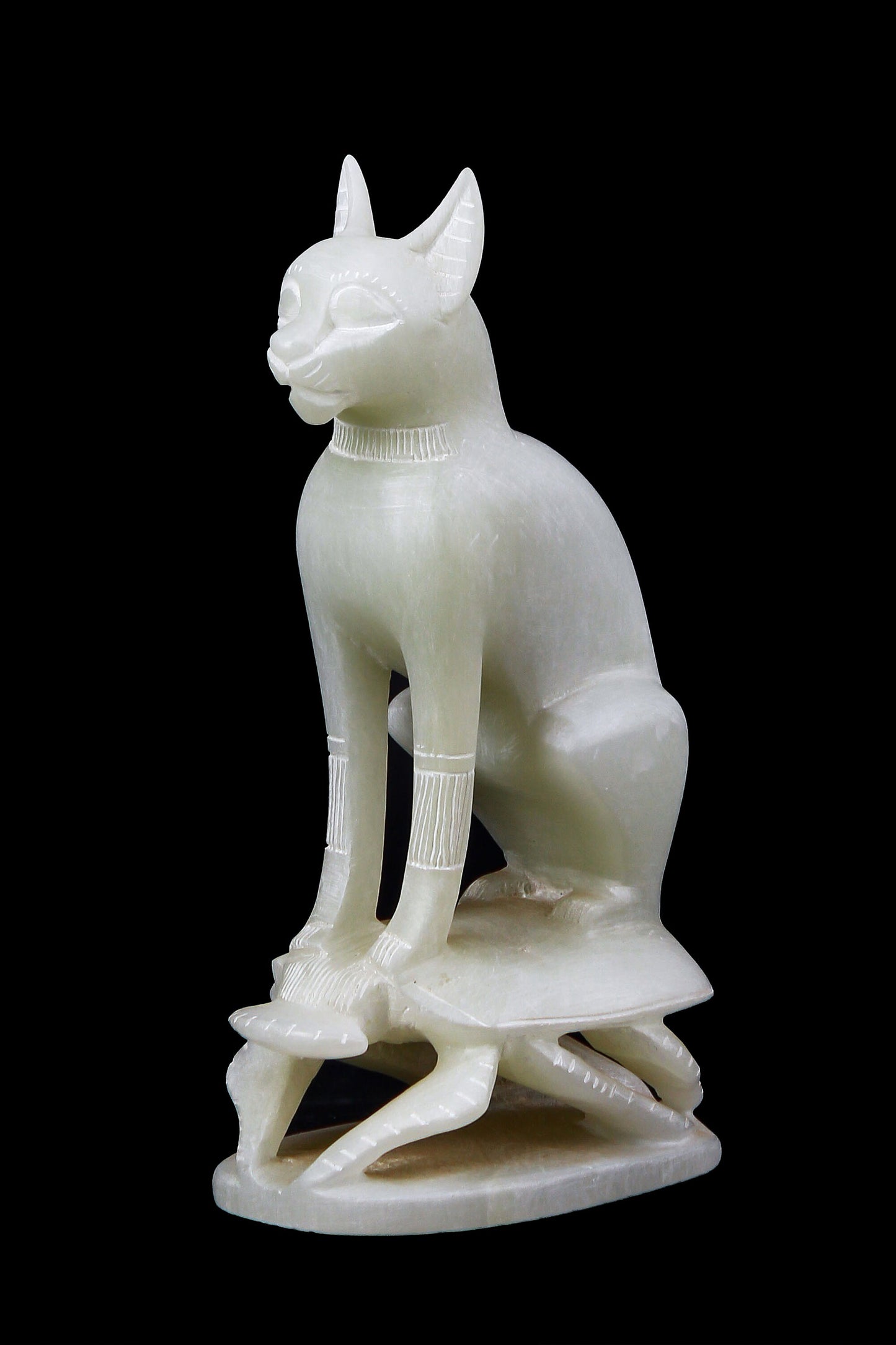 Ancient Egyptian statue of goddess Bastet cat standing on a Scarab hand carved Soap stone made in Egypt