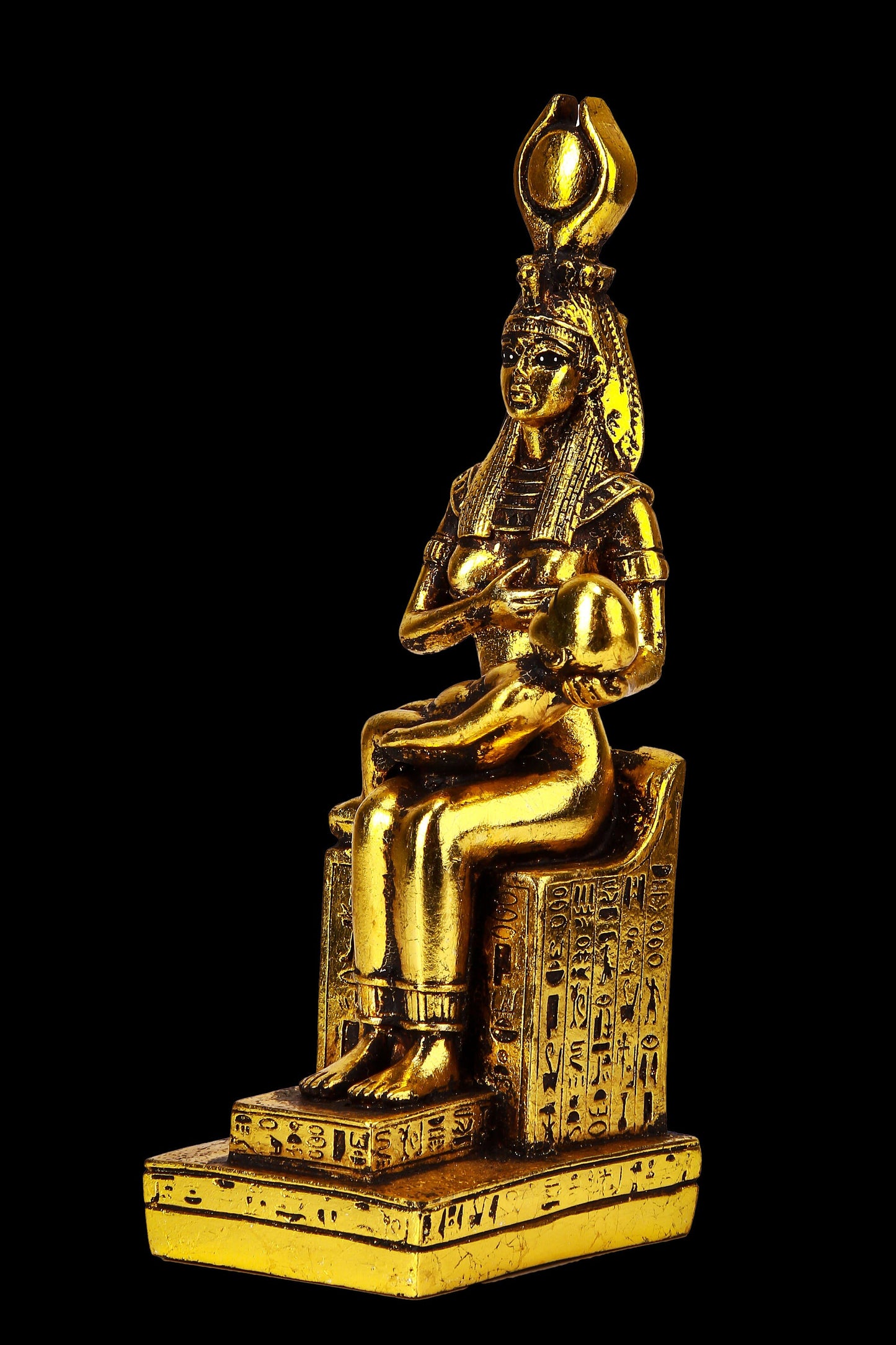 Ancient Egyptian statue of goddess Isis breastfeeds her son Horus made in Egypt