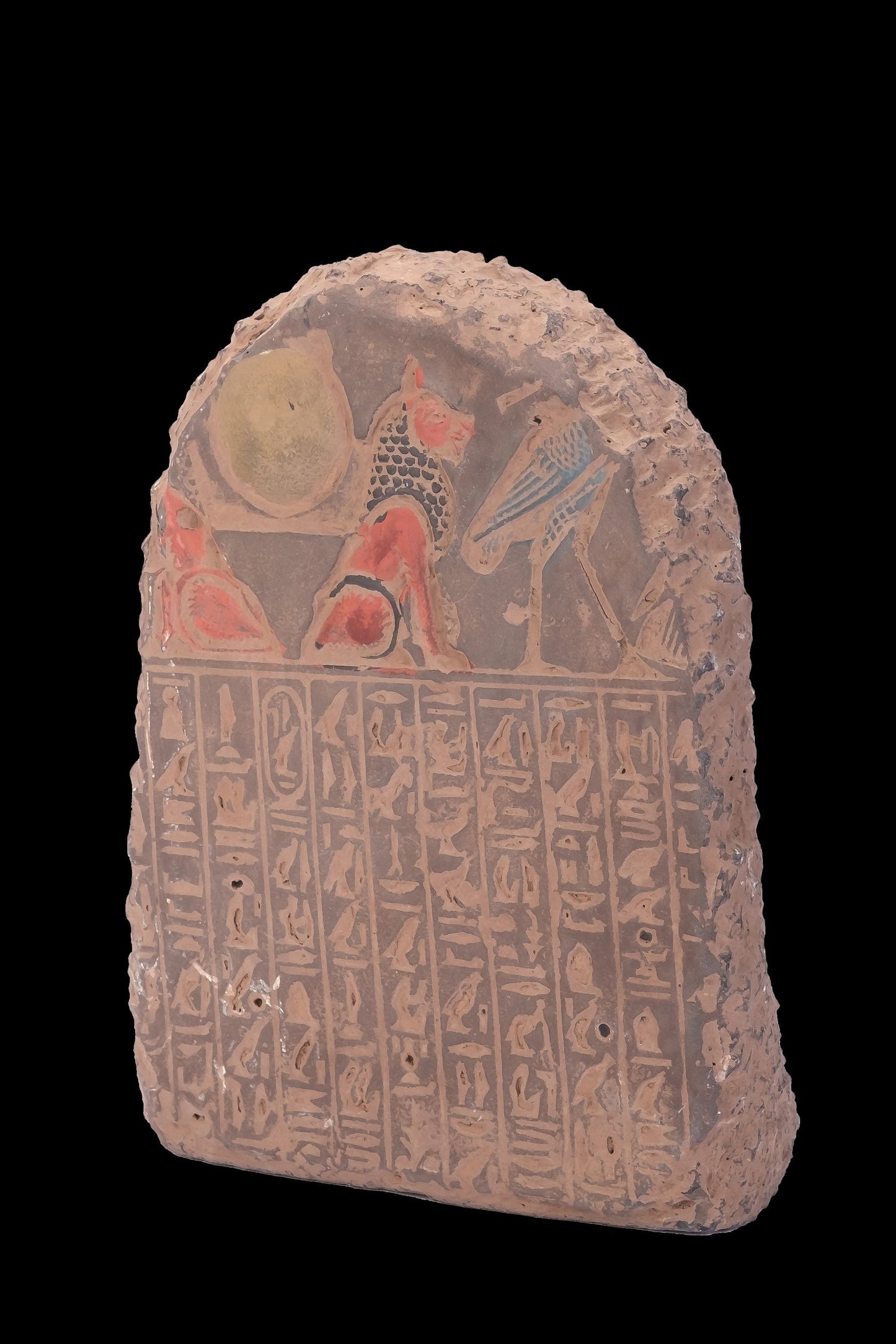Ancient Egyptian statue of Pharaoh king Ramses II seated on the throne carved with ancient Egyptian hieroglyphics, great court