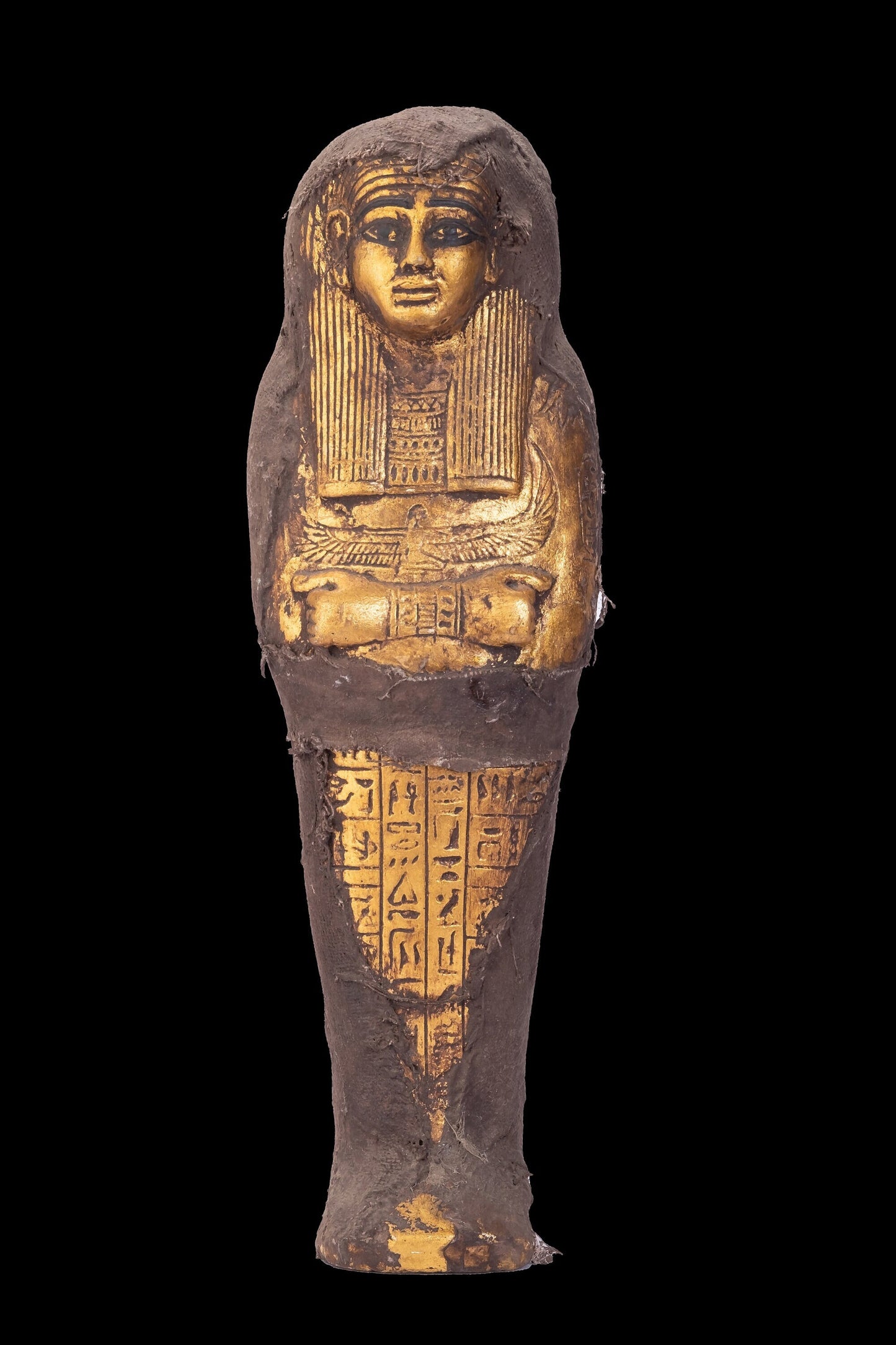 Unique ancient Egyptian statue of Ushabti goddess Isis with Maat wings protecting her carved with hieroglyphics and wrapped with linen