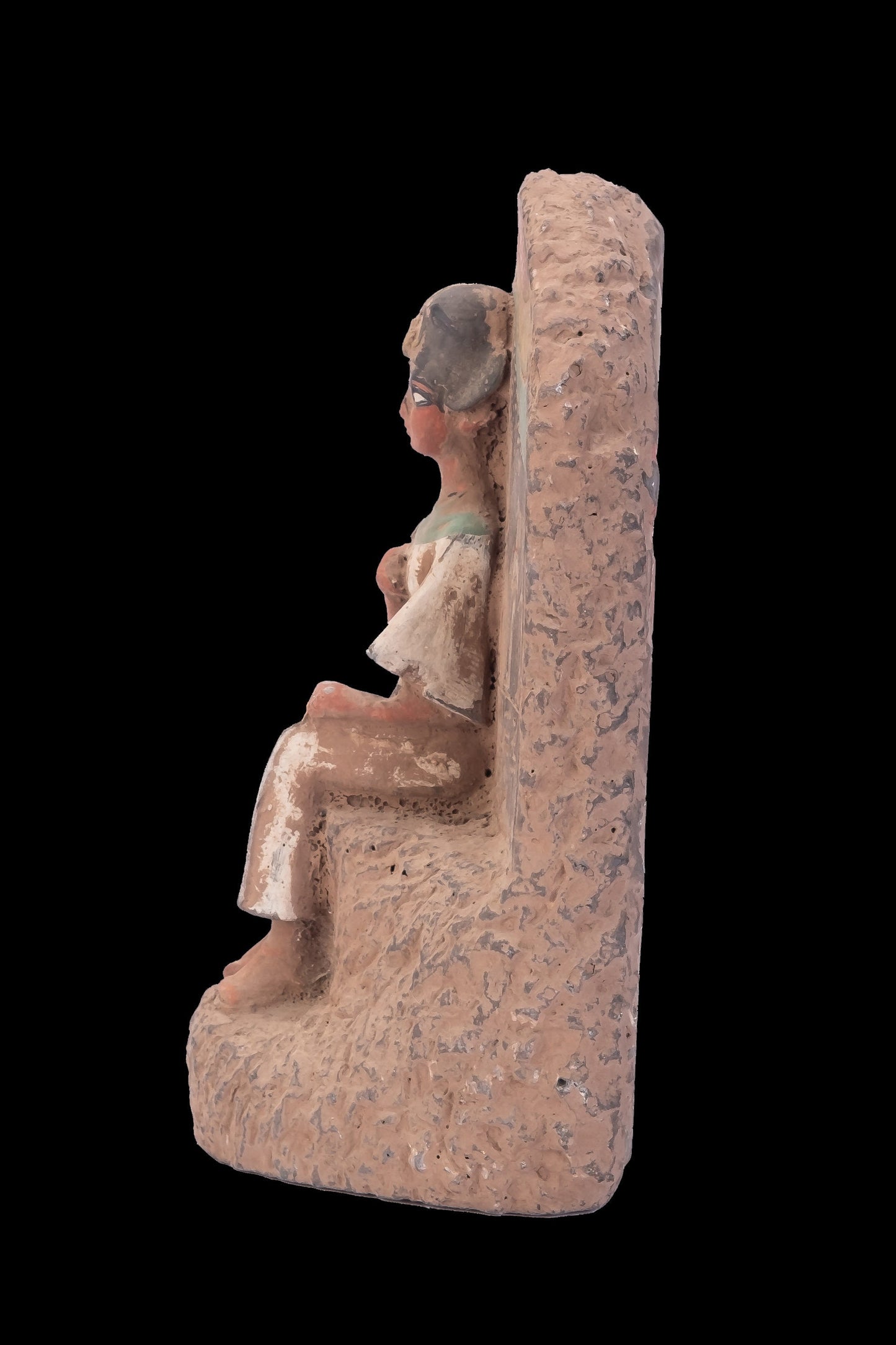 Ancient Egyptian statue of Pharaoh king Ramses II seated on the throne carved with ancient Egyptian hieroglyphics, great court