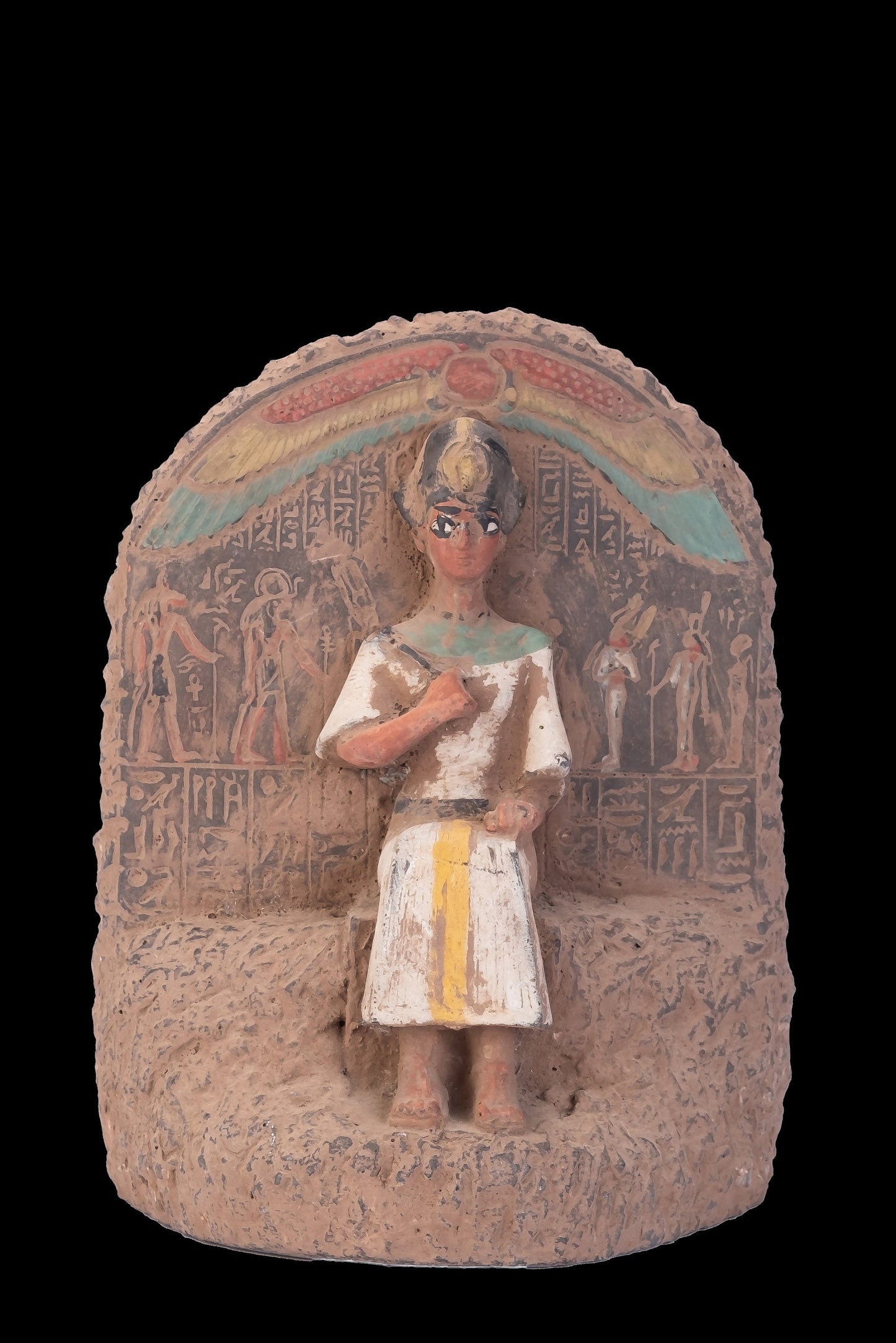 Ancient Egyptian statue of Pharaoh king Ramses II seated on the throne carved with ancient Egyptian hieroglyphics, great court