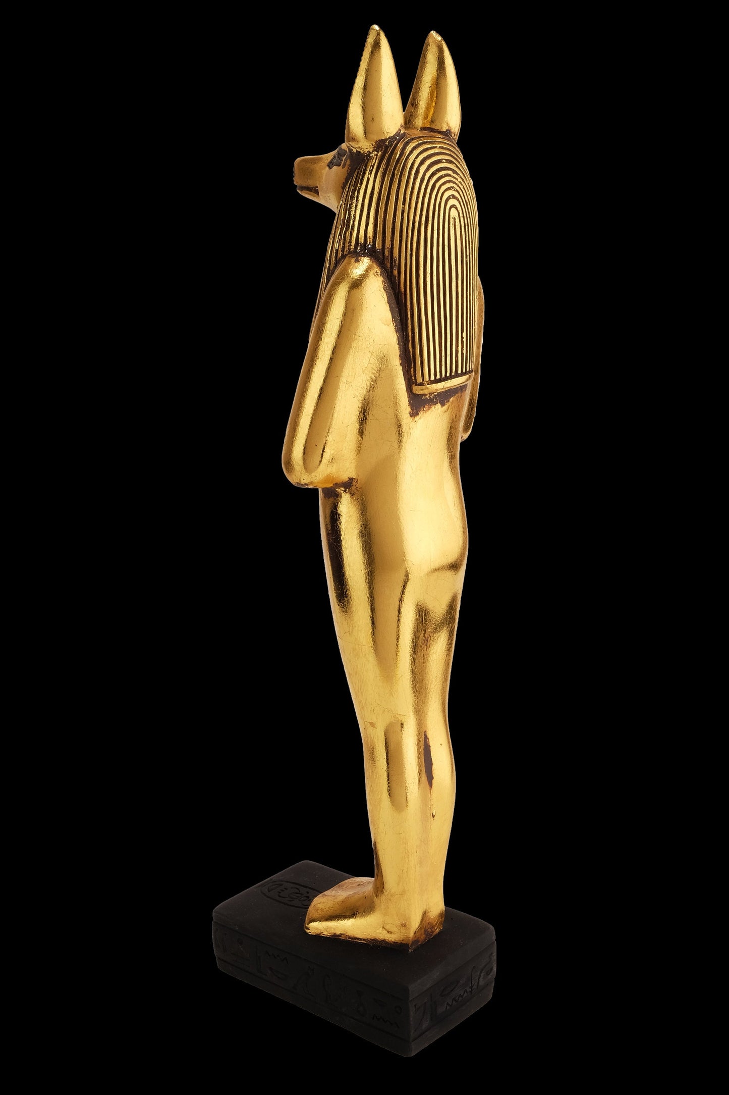 Aancient Egyptian statue of Anubis Jackal God of afterlife and mummification standing in form mummy with Jackal head Gold leaf hand painted
