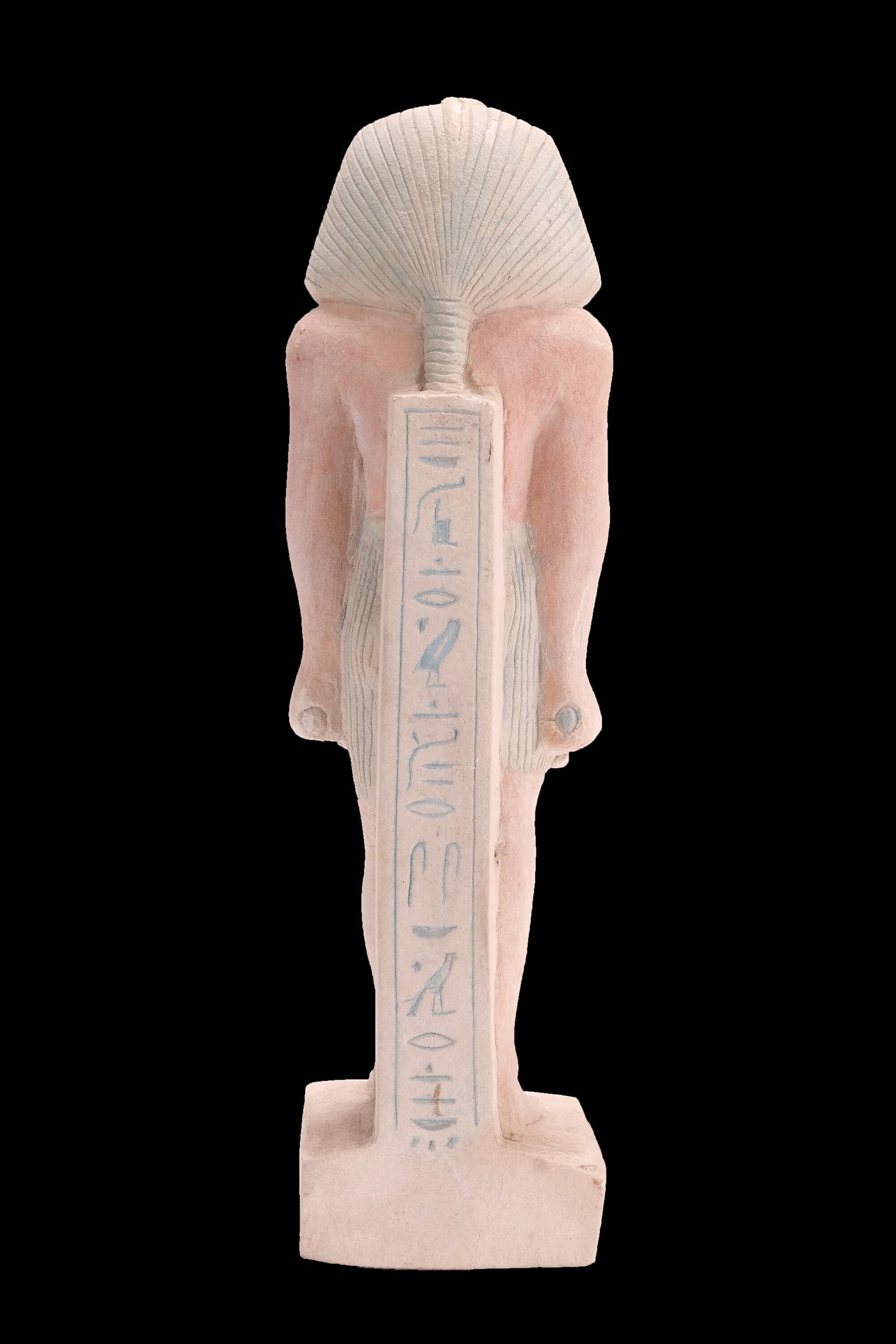Ancient Egyptian statue of Pharaoh king Ramses II standing hand made from lime stone made in Egypt