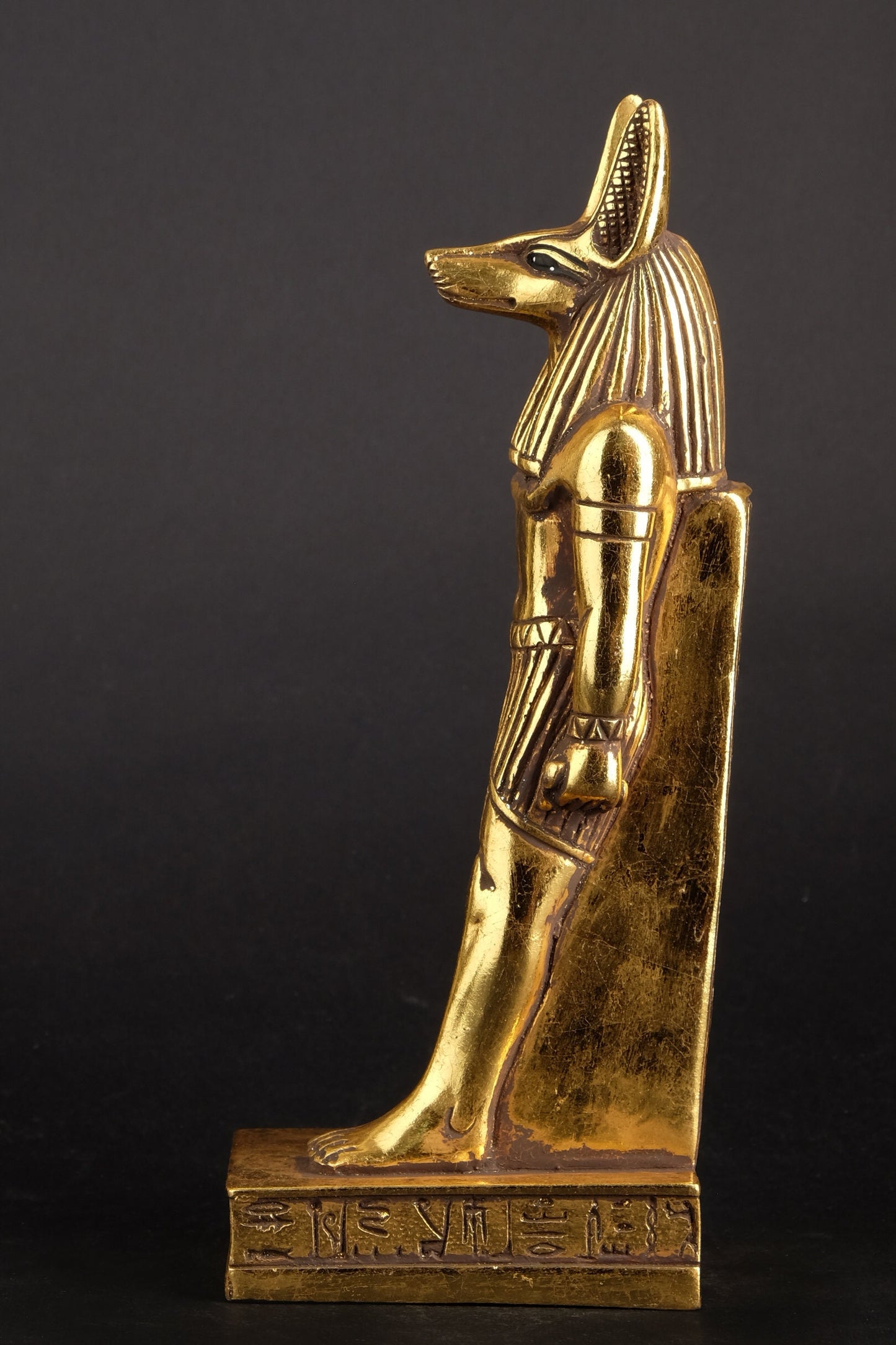 A unique ancient Egyptian statue of Anubis Jackal God of afterlife and mummification heavy stone Gold leaf hand painted made in Egypt