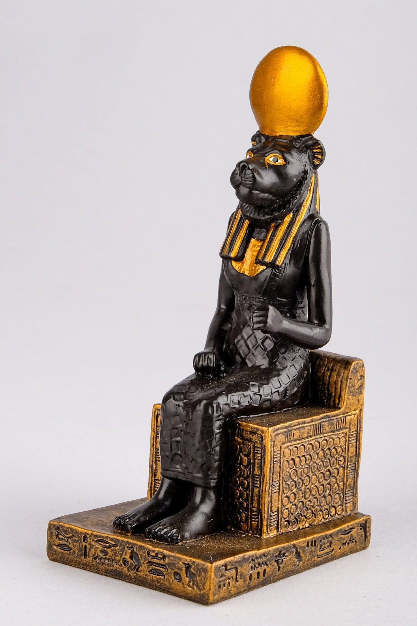 Ancient Egyptian small statue of Sekhmet,goddess of war seated, unique black and bronze color made in Egypt