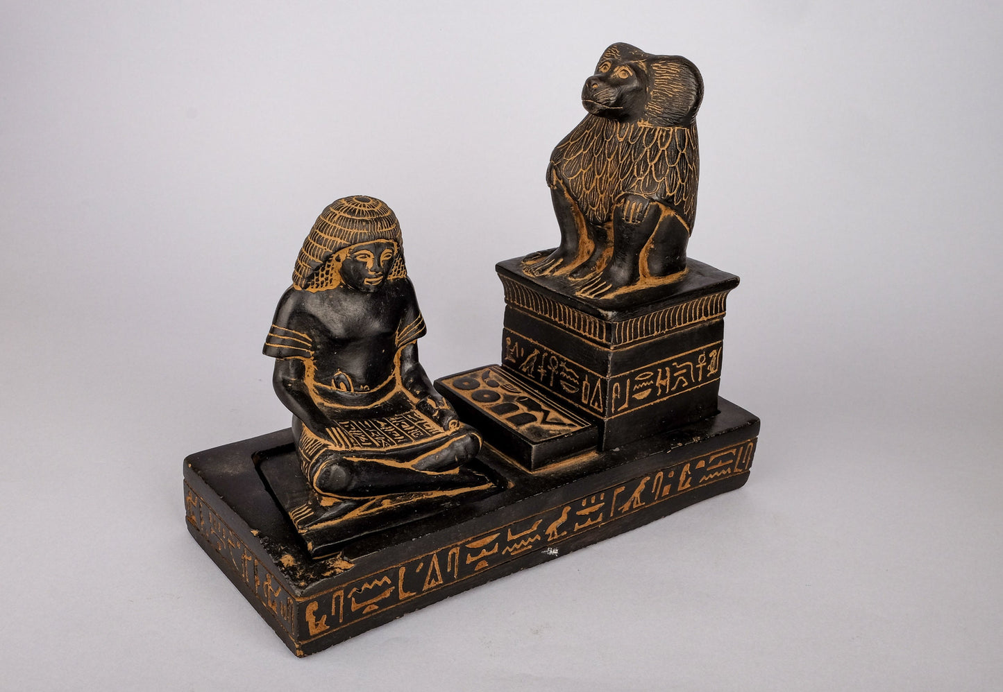 Unique Ancient Egyptian statue of The royal Scribe Nebmertuf writing under the protection of the Moon God Thoth