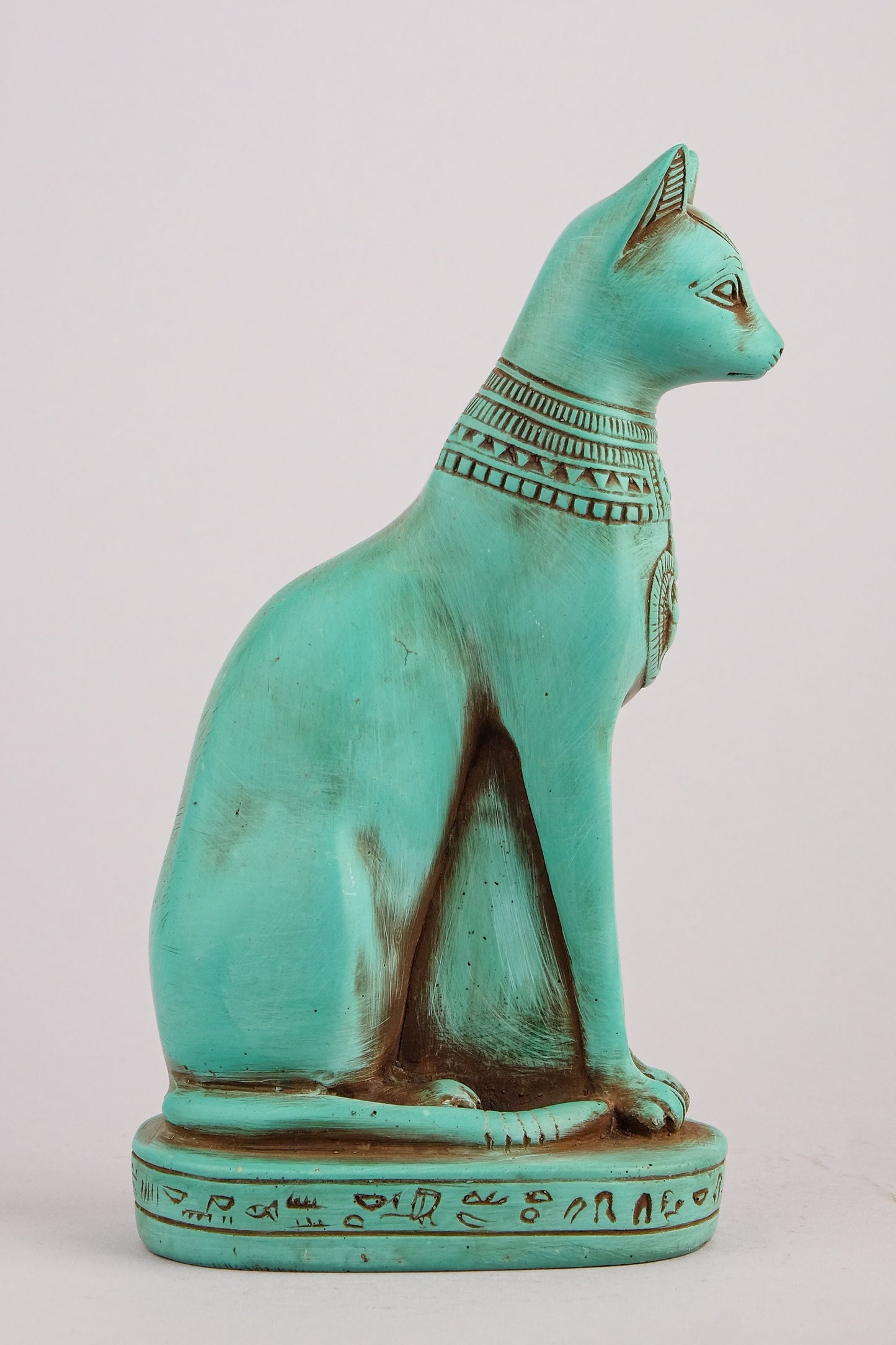 Egyptian statue of goddess Bastet cat heavy green stone made in Egypt. Bastet in her late form of a cat-headed woman, rather than a lioness