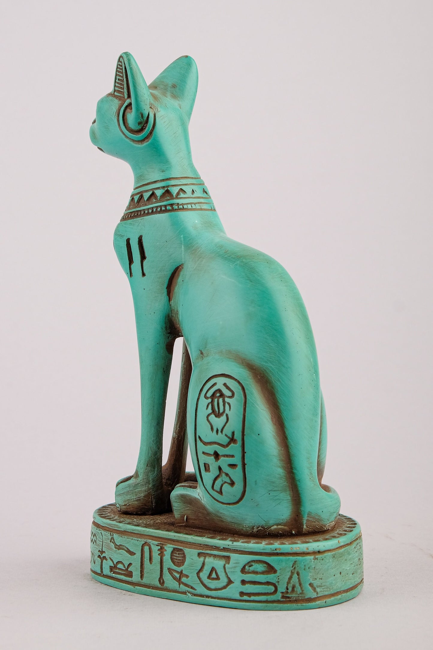 Unique Bastet cat Statue heavy green stone with scarab on her chest, symbols hieroglyphic inscriptions around the base made in Egypt