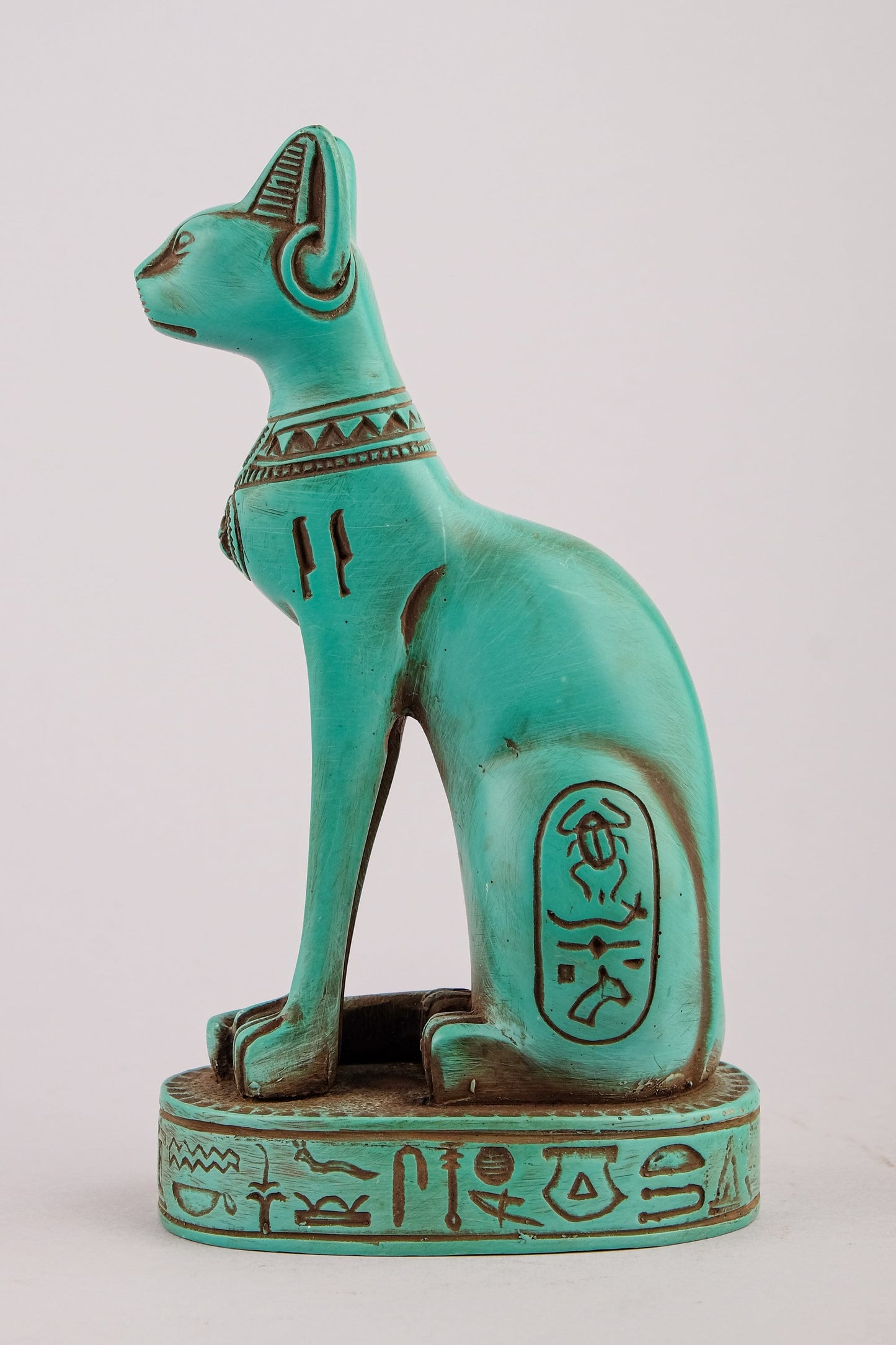 Unique Bastet cat Statue heavy green stone with scarab on her chest, symbols hieroglyphic inscriptions around the base made in Egypt