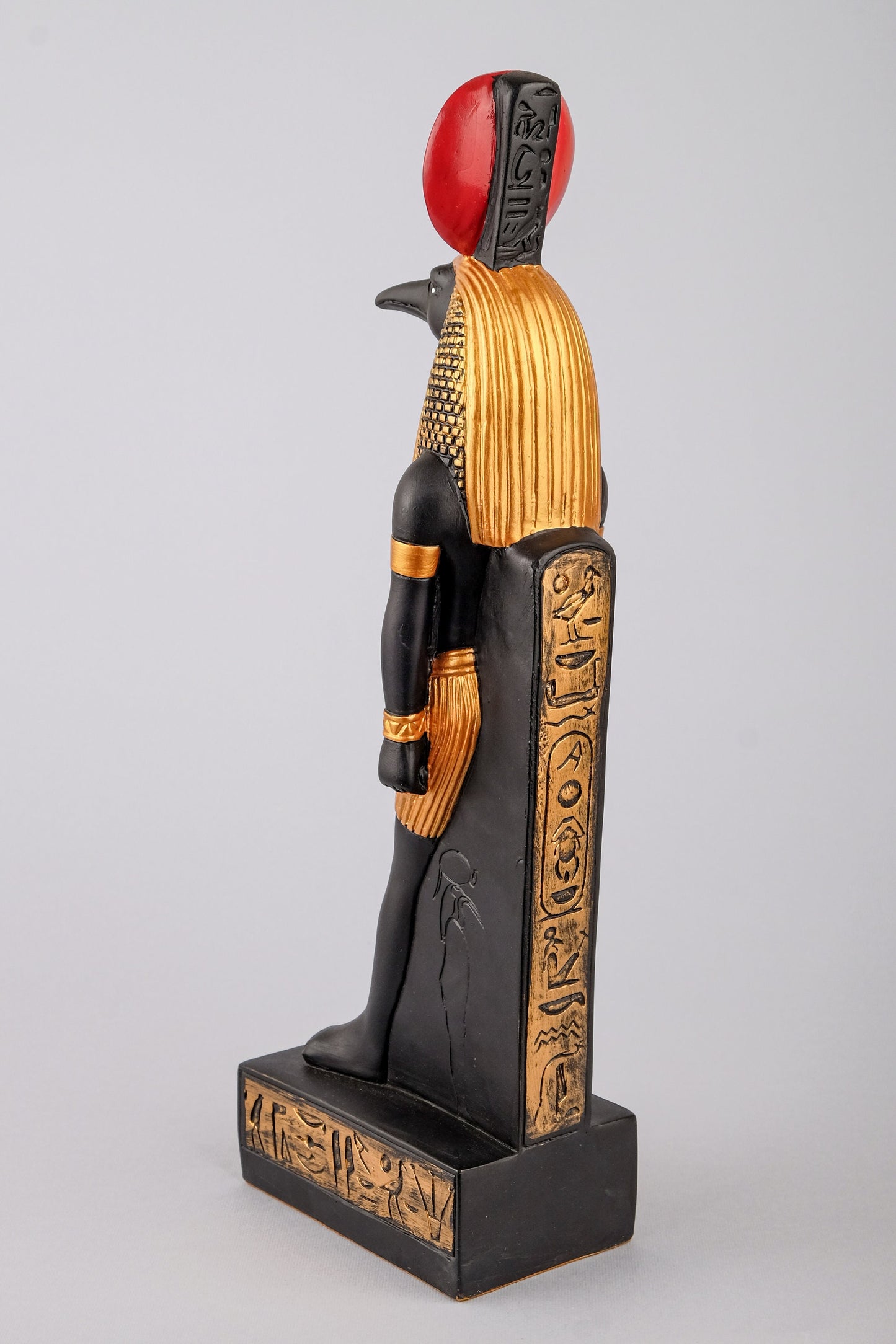 Ancient Egyptian statue of Thoth symbol of moon, magic, and master of knowledge. Large painted black gold ancient Egyptian art made in Egypt