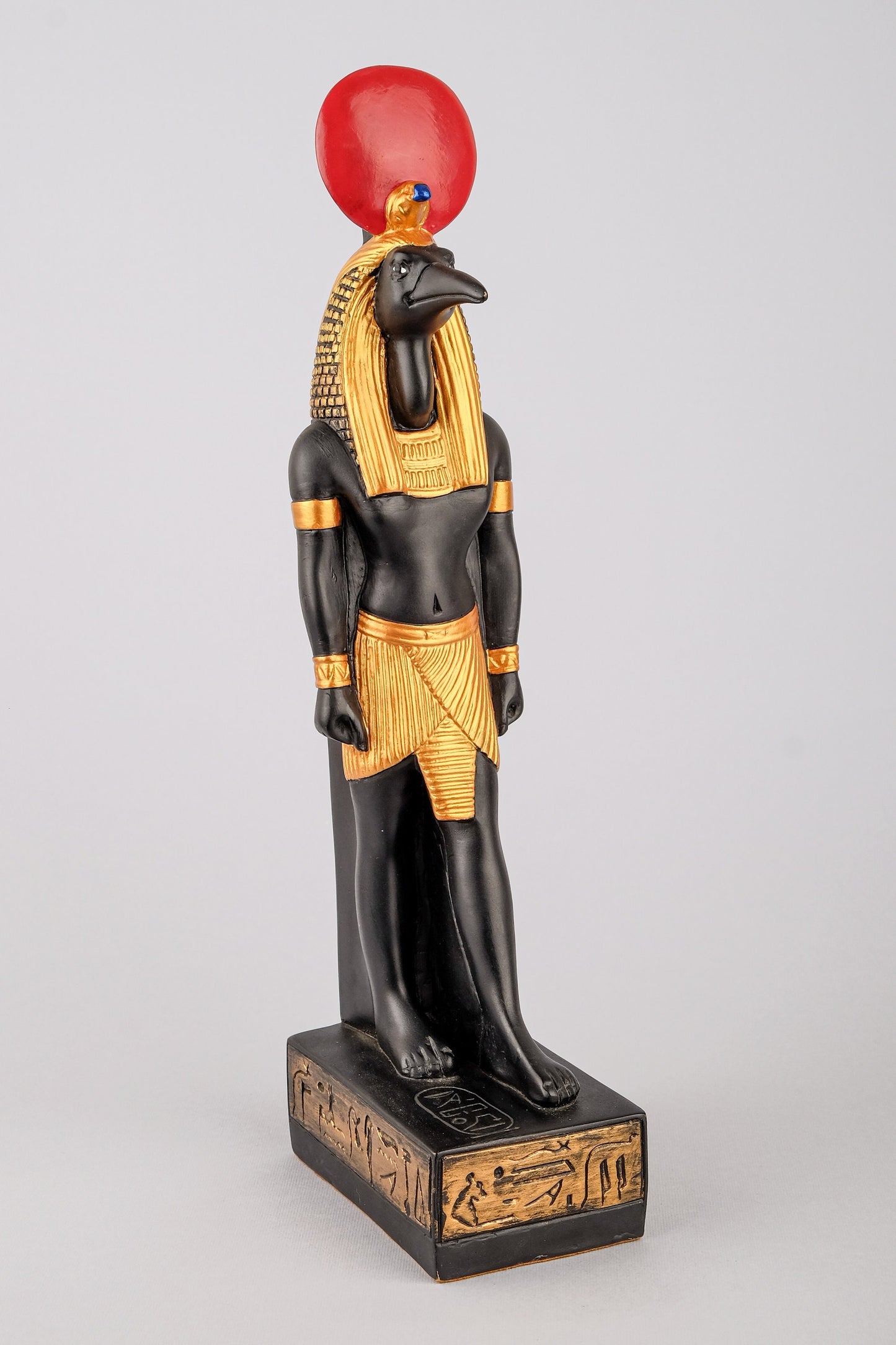 Ancient Egyptian statue of Thoth symbol of moon, magic, and master of knowledge. Large painted black gold ancient Egyptian art made in Egypt