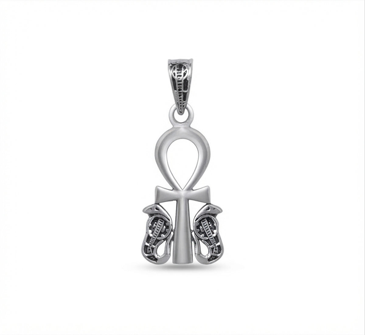 handcrafted Egyptian silver 925 pendant featuring the traditional Ankh symbol (Key of Life), detailed with protective Uraeus cobras on both sides."