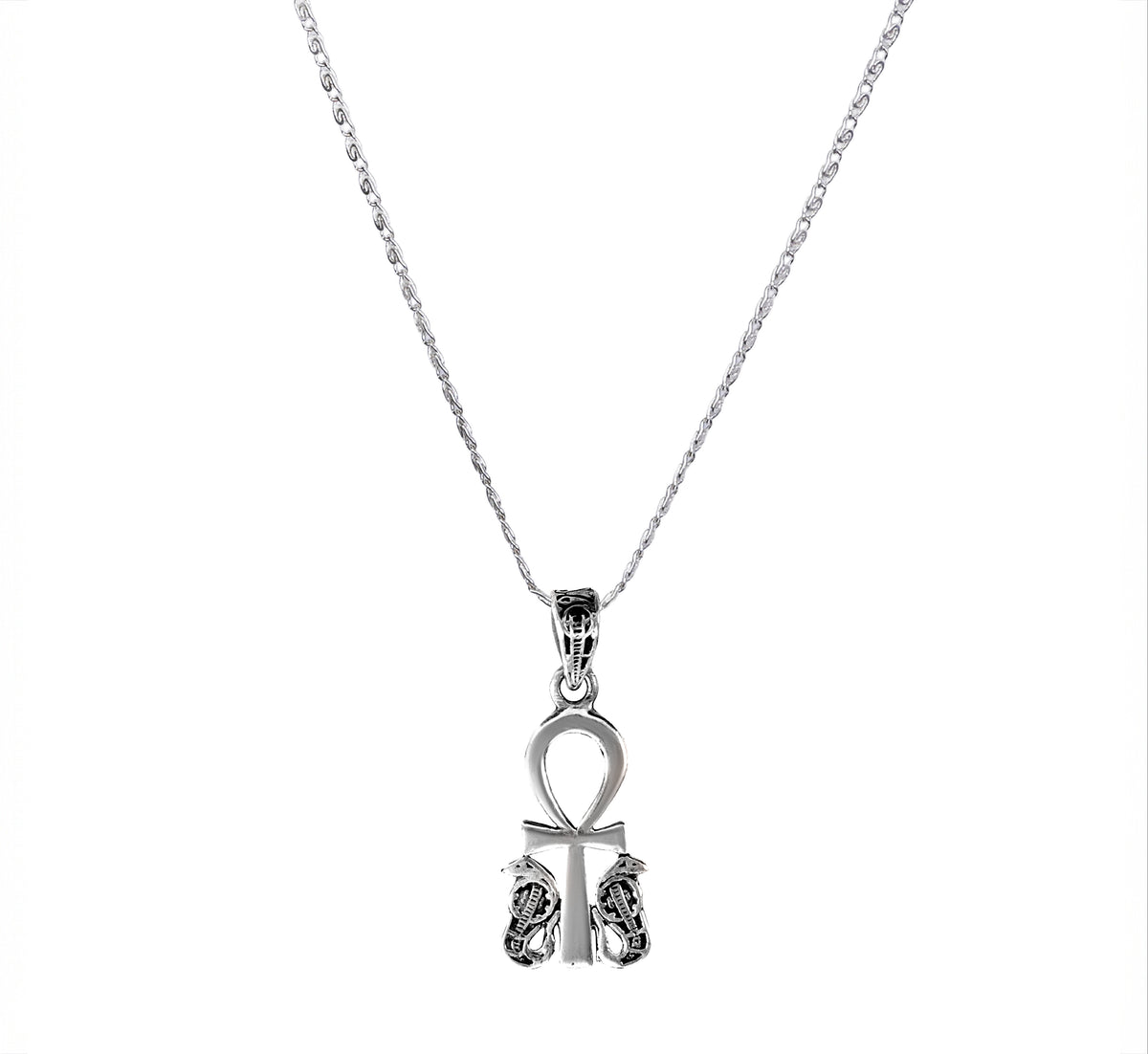 handcrafted Egyptian silver 925 pendant featuring the traditional Ankh symbol (Key of Life), detailed with protective Uraeus cobras on both sides."