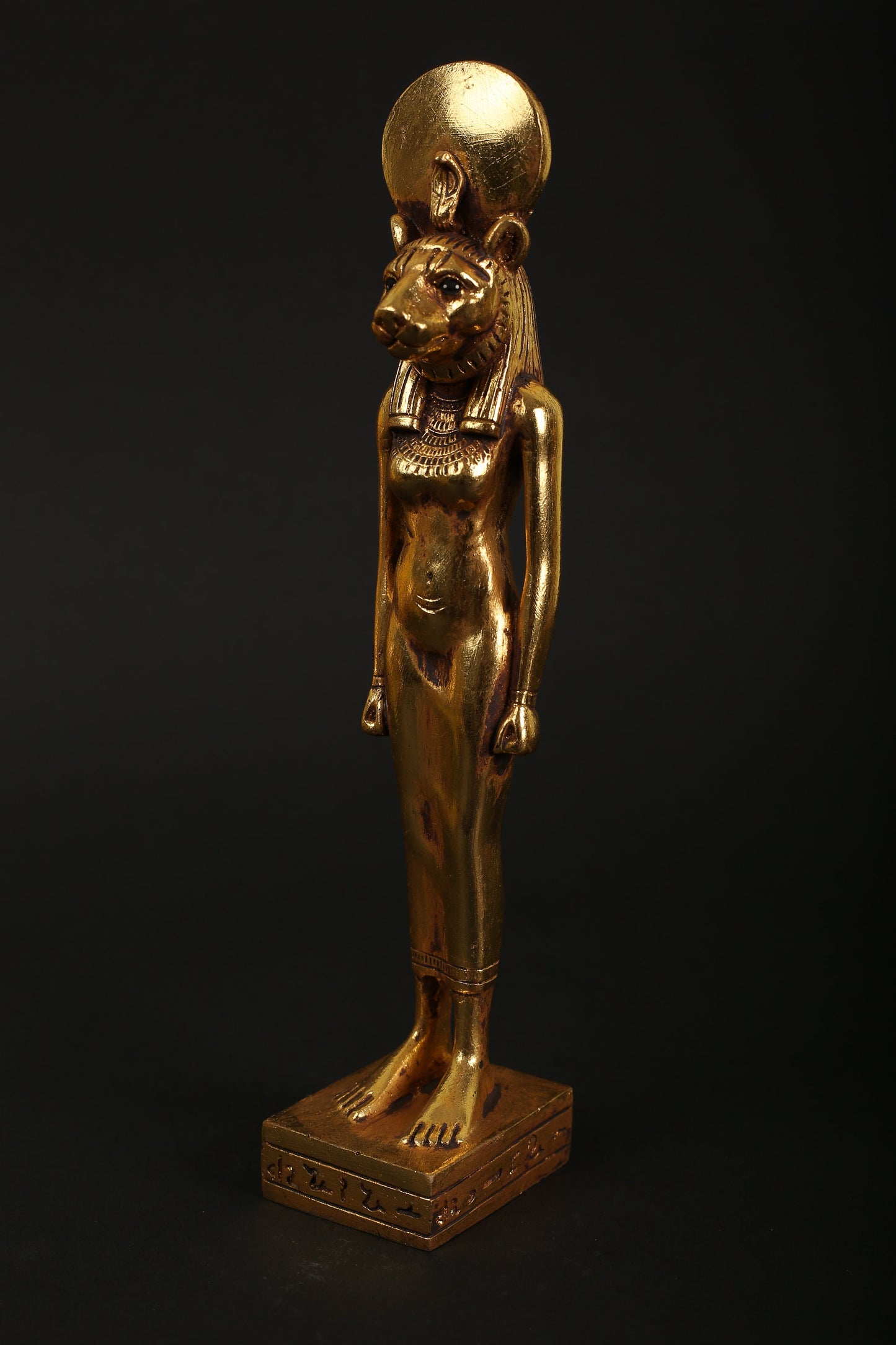 Statue of Sekhmet the God of healing in Ancient Egypt made of polystone with gold leaf hand Paint