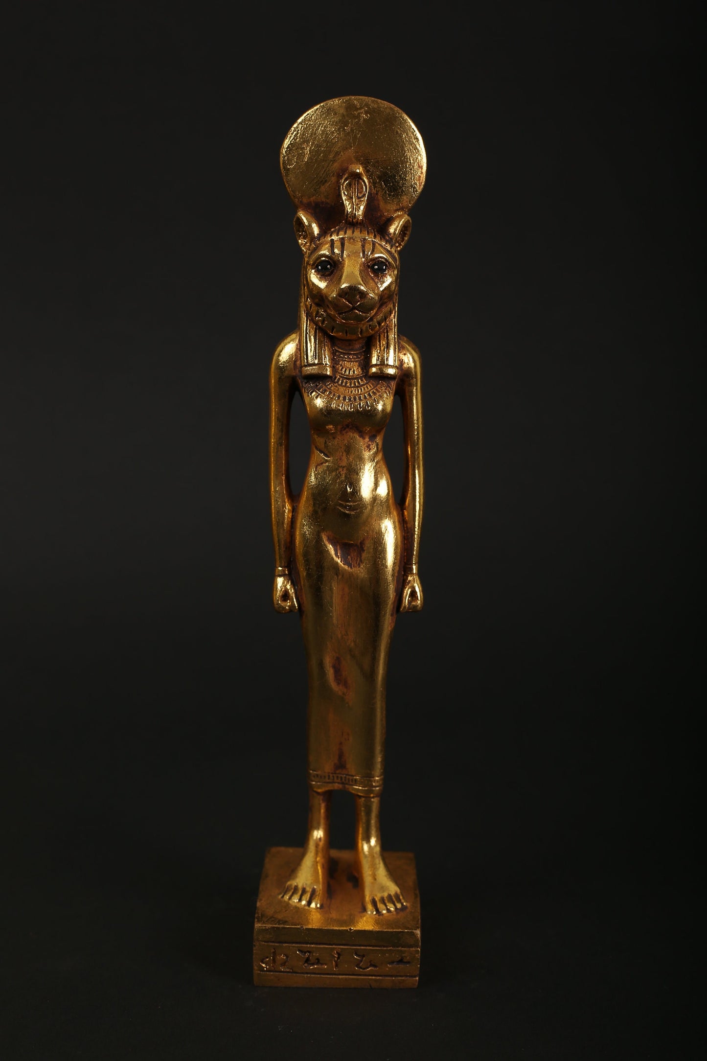 Statue of Sekhmet the God of healing in Ancient Egypt made of polystone with gold leaf hand Paint