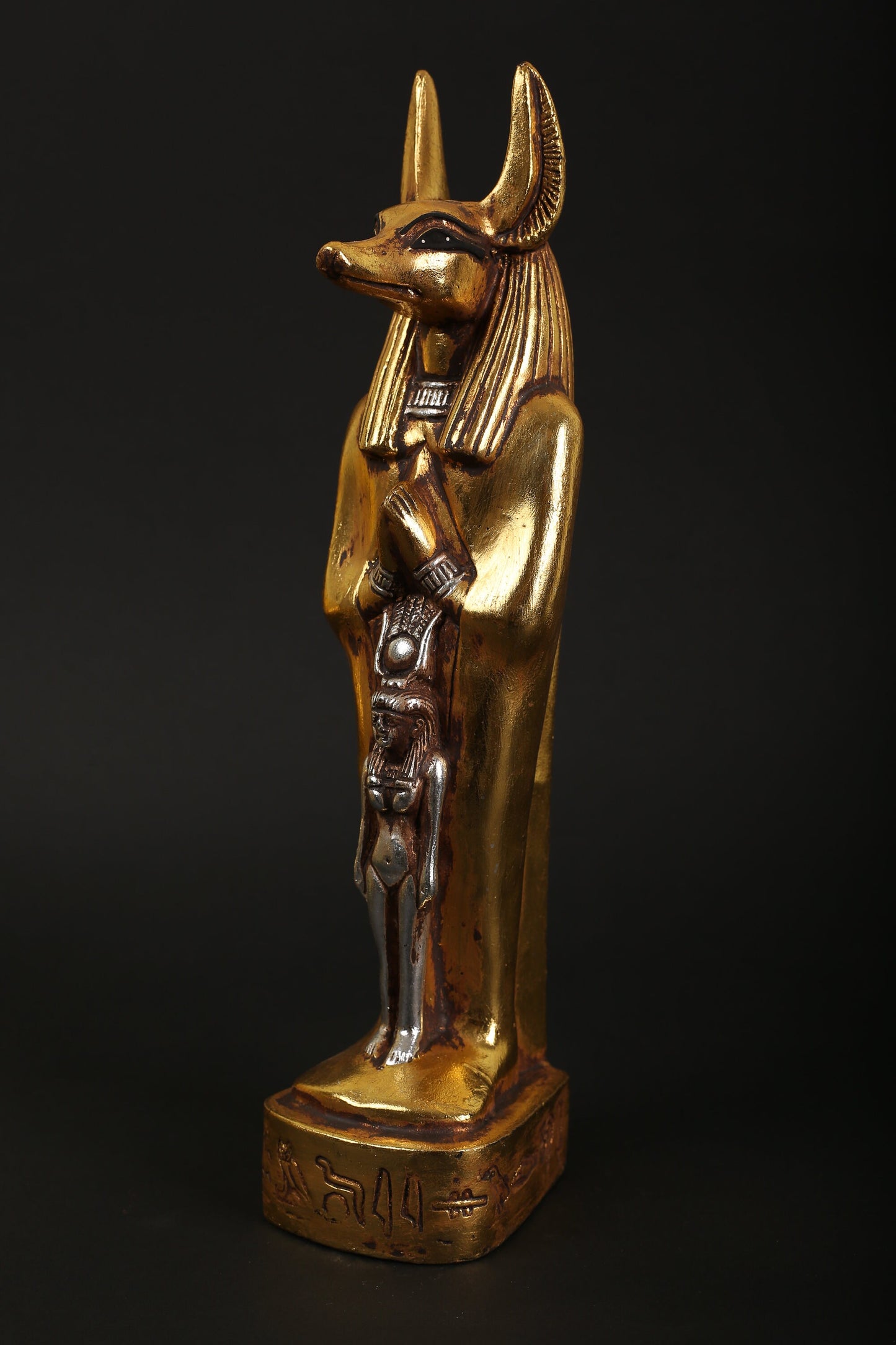 Statue of Anubis with Isis made of heavy stone with gold and silver leaf hand Paint