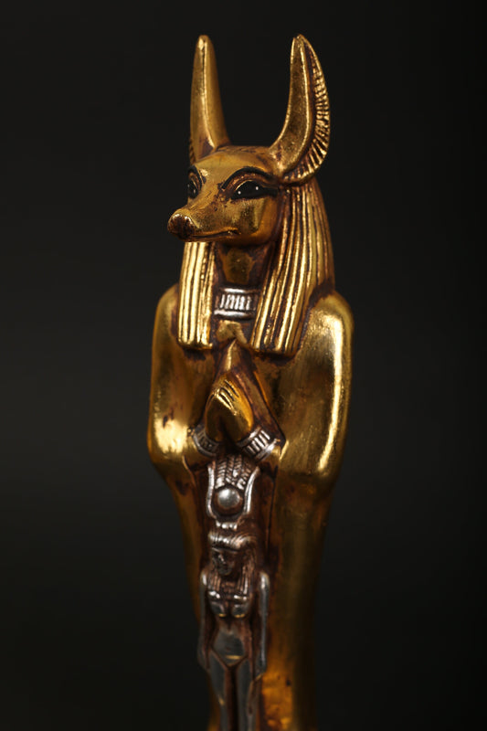 Statue of Anubis with Isis made of heavy stone with gold and silver leaf hand Paint