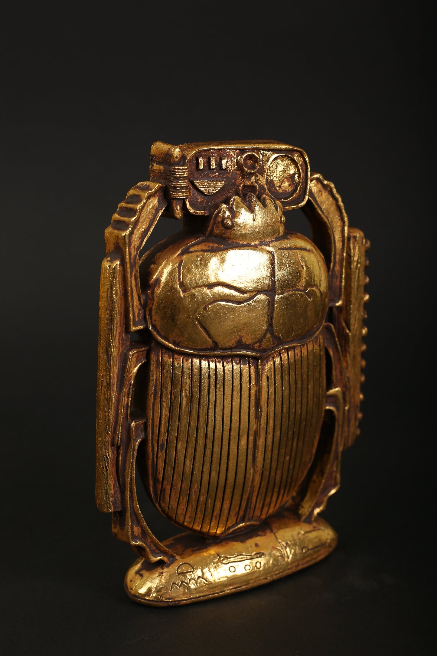 Ancient Egyptian Scarab made of polystone with gold leaf hand