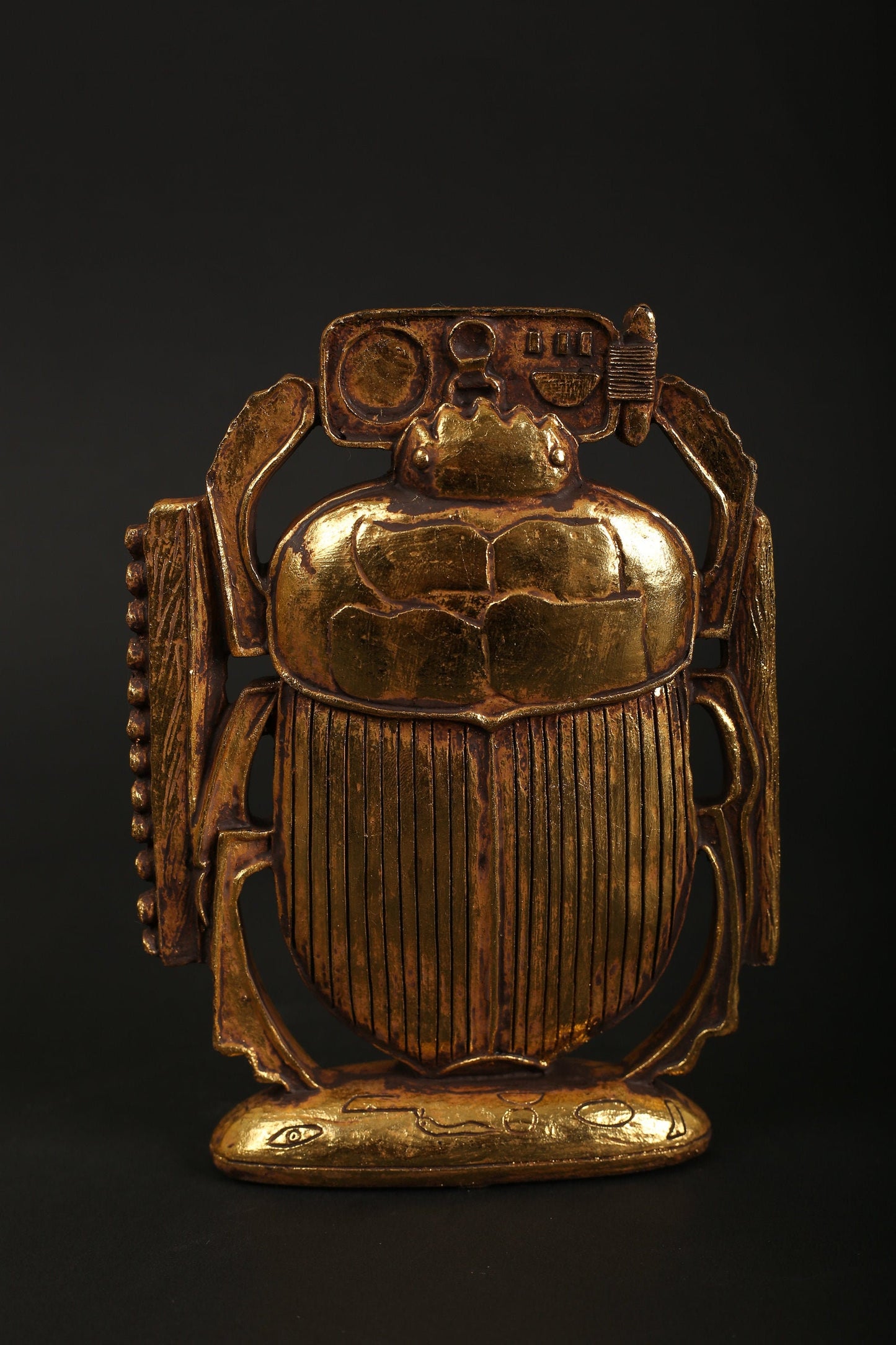 Ancient Egyptian Scarab made of polystone with gold leaf hand