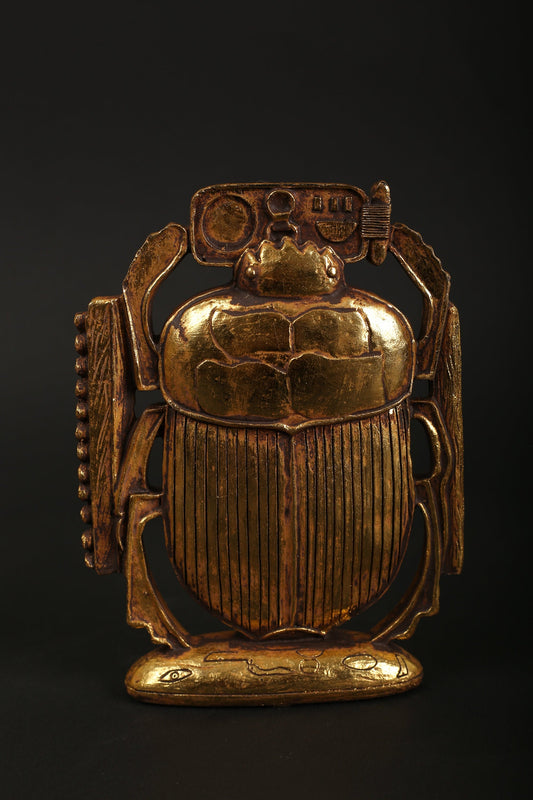 Ancient Egyptian Scarab made of polystone with gold leaf hand