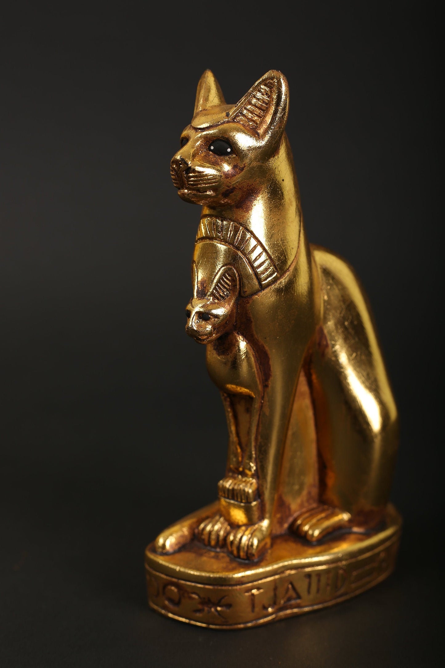 Statue of Egyptian Goddess Bastet cat made of stone with gold leaf hand Paint