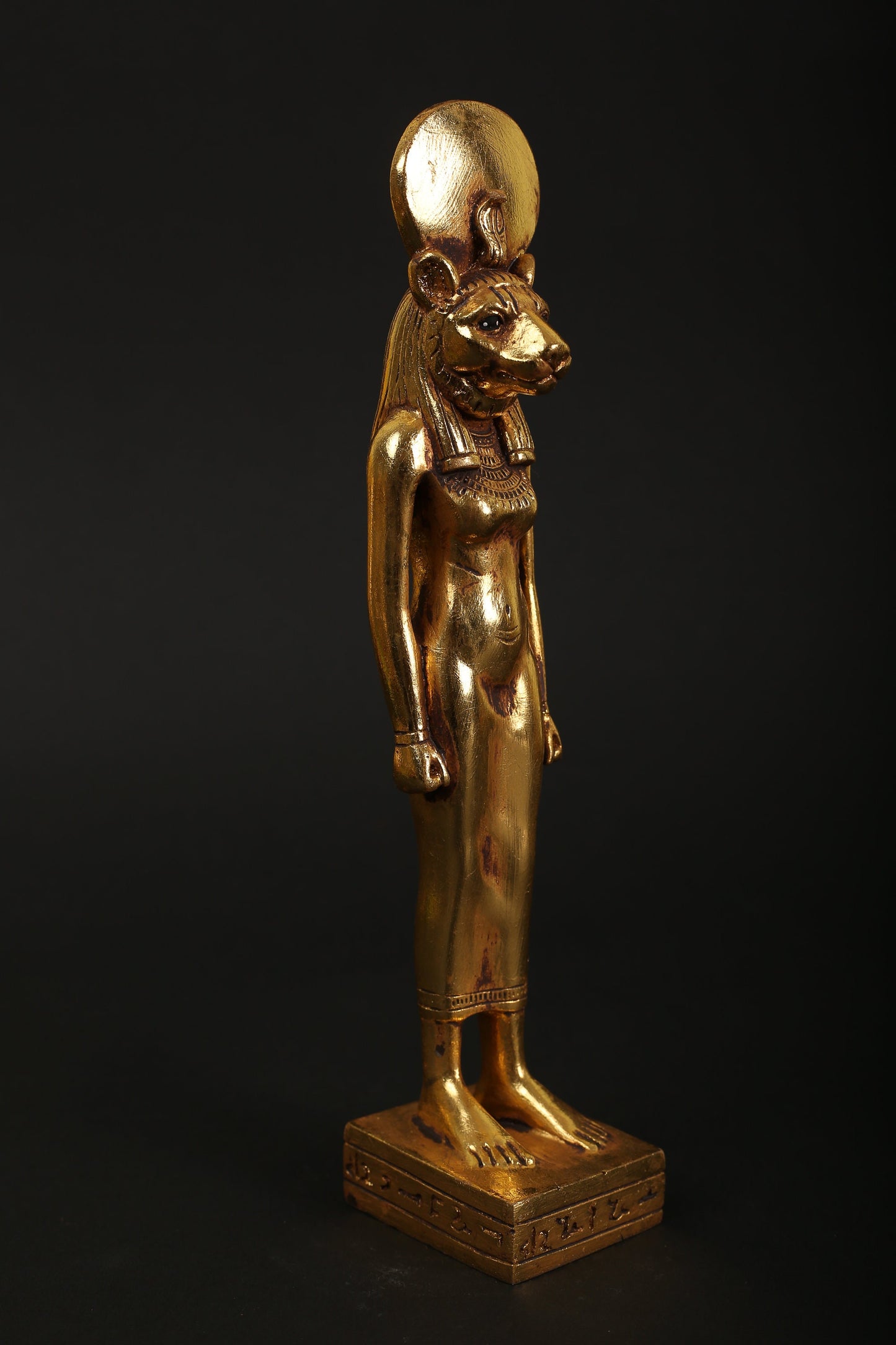 Statue of Sekhmet the God of healing in Ancient Egypt made of polystone with gold leaf hand Paint