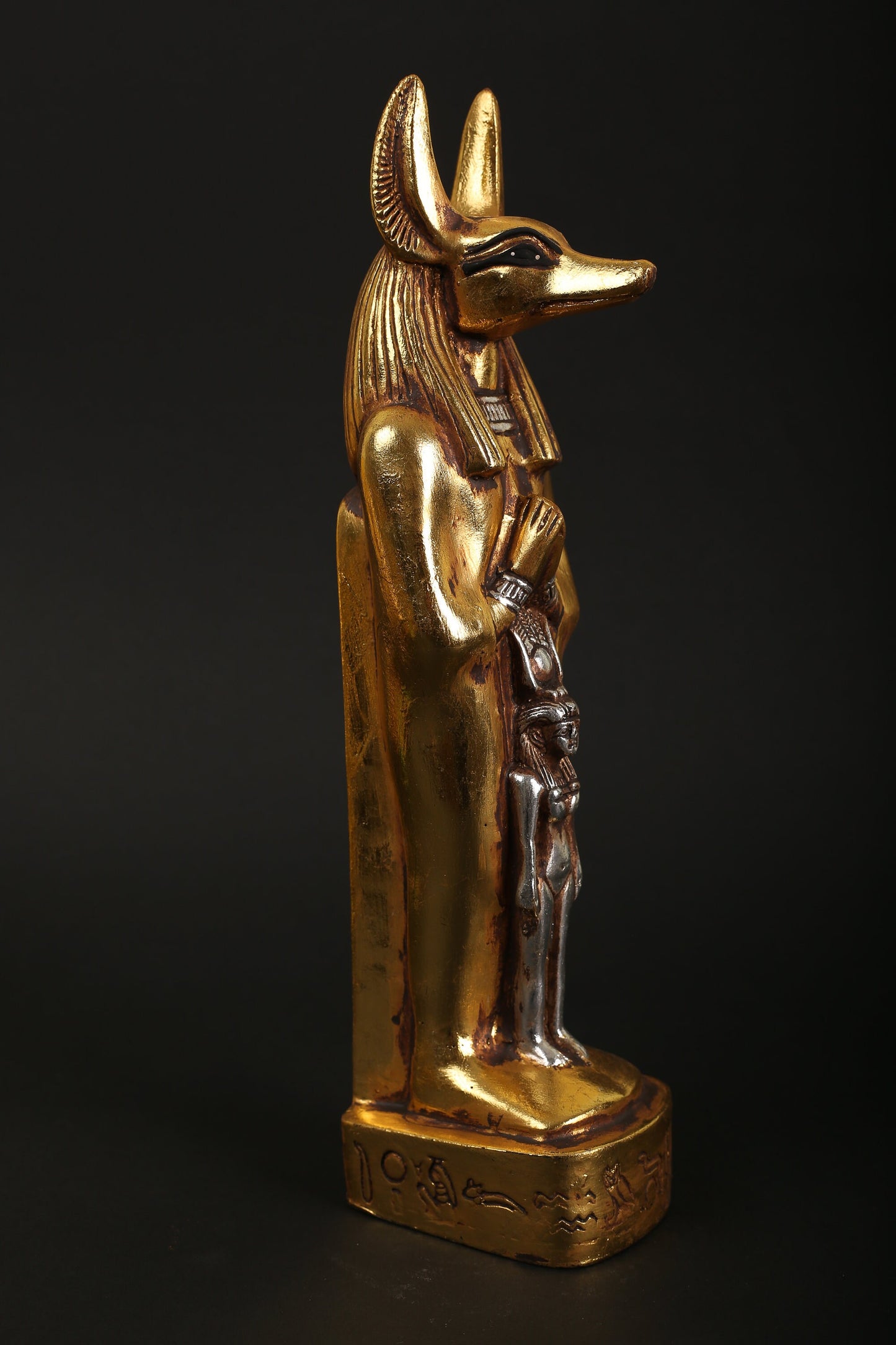 Statue of Anubis with Isis made of heavy stone with gold and silver leaf hand Paint