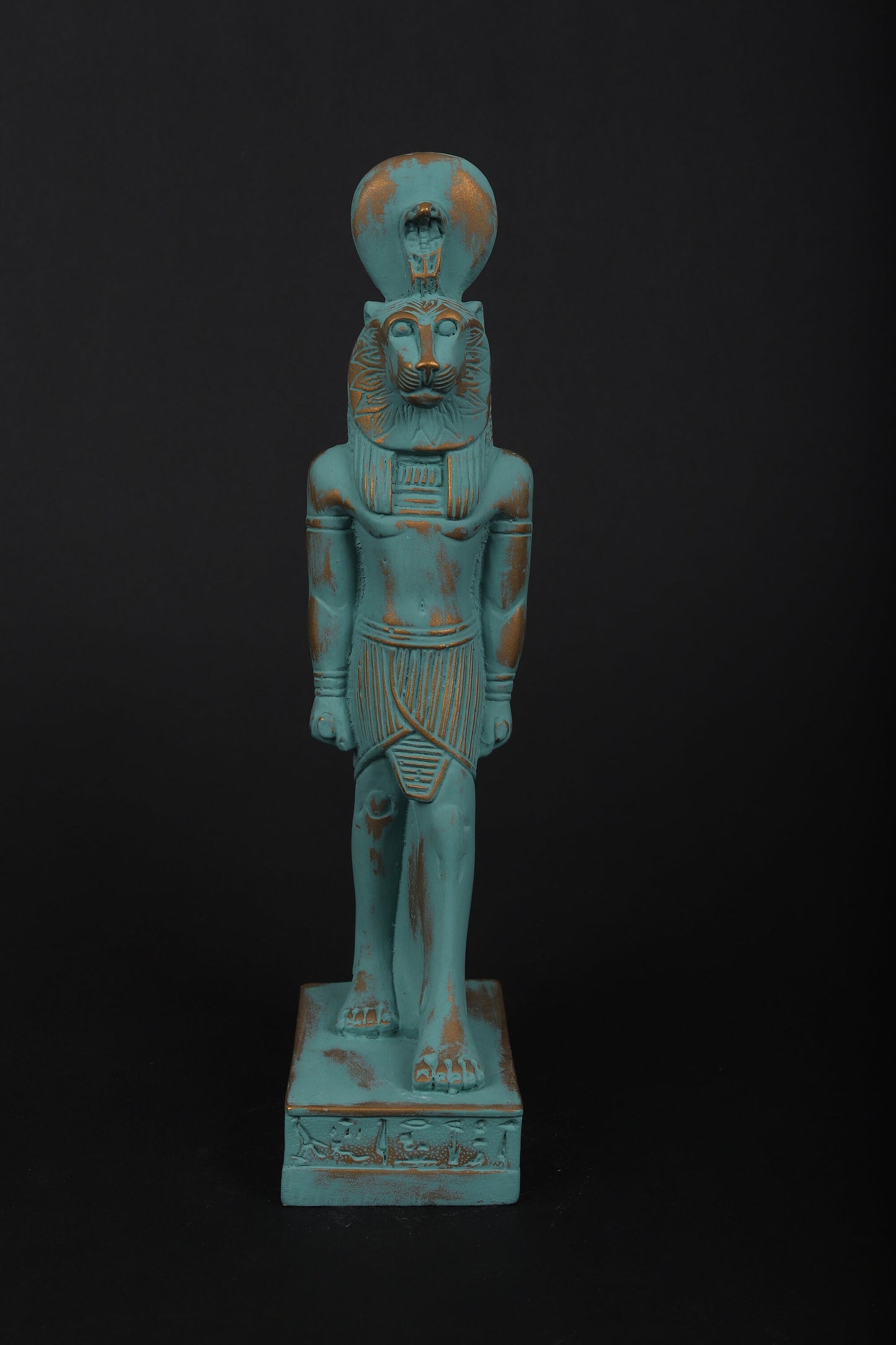 statue of Sekhmet Goddess of healing and War painted with a green color and gold antique