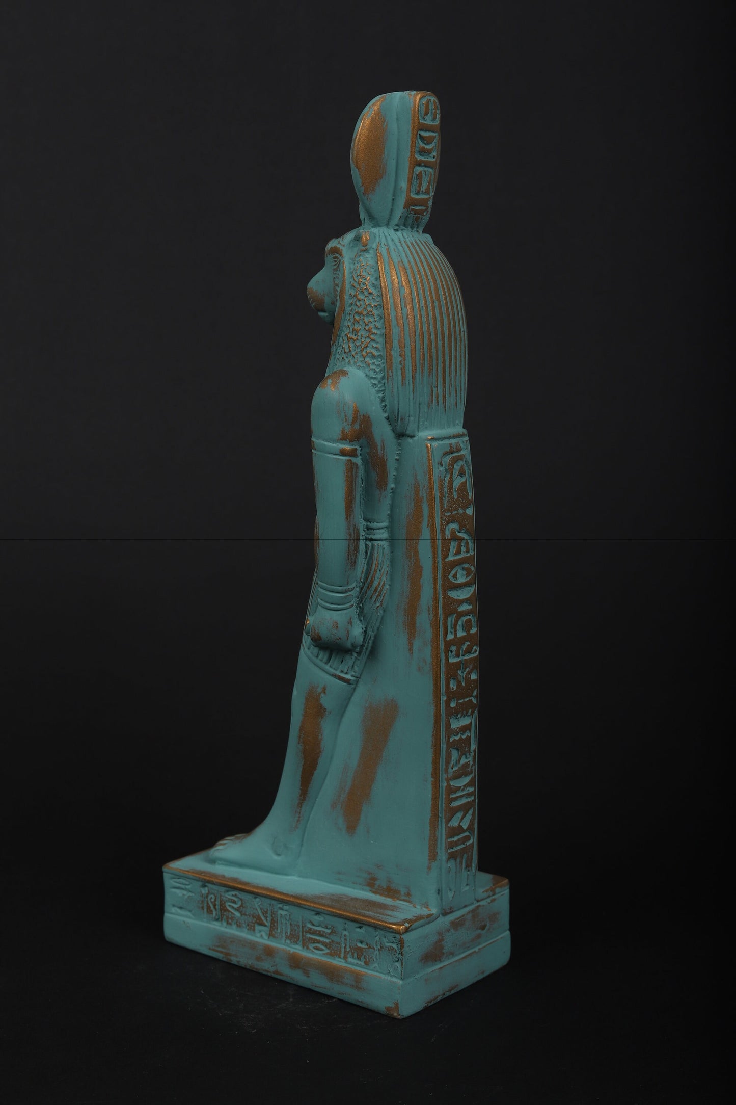 statue of Sekhmet Goddess of healing and War painted with a green color and gold antique