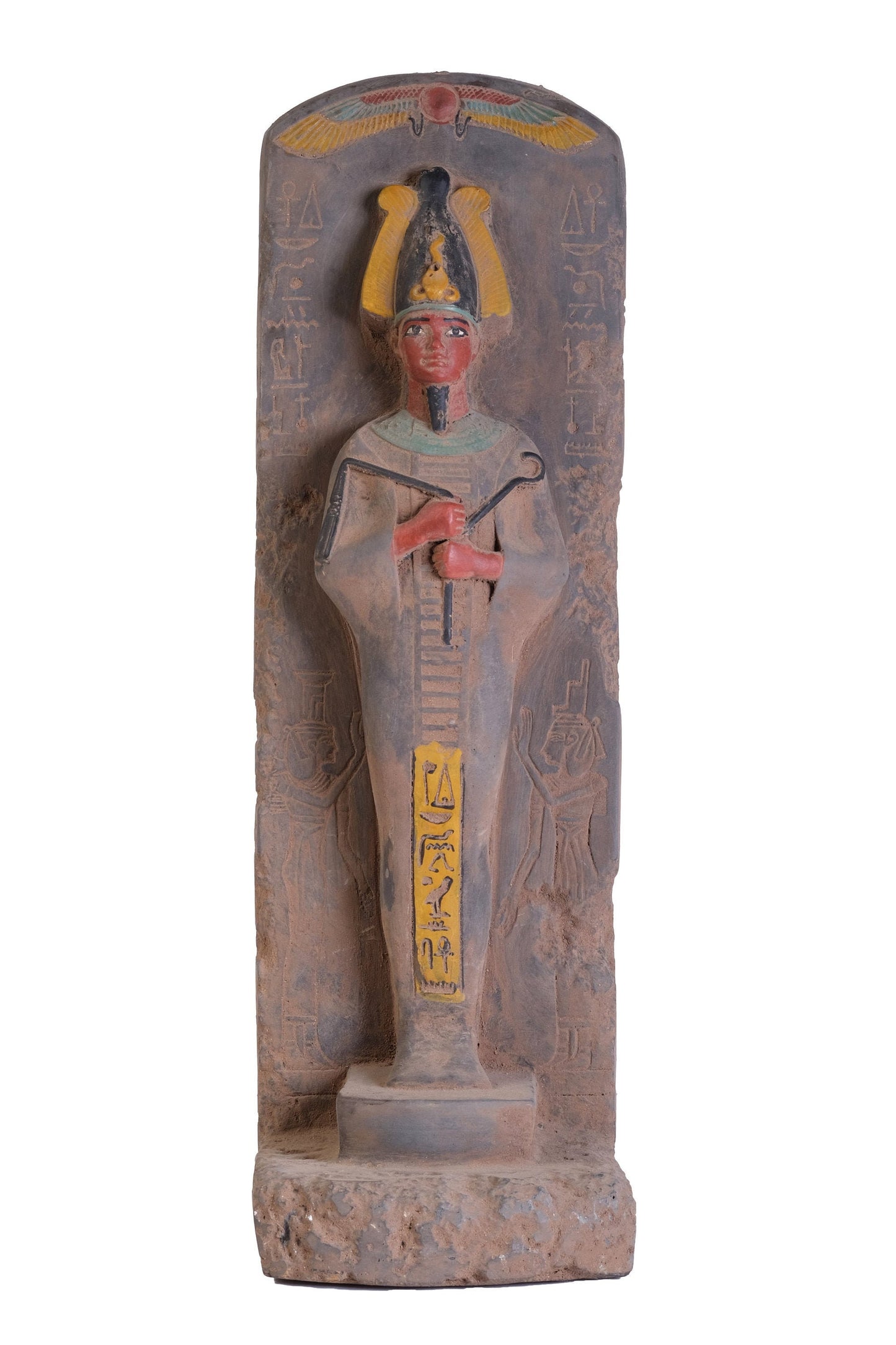 Statue antique of the Egyptian Osiris Lord of the Dead, The underworld and rebirth made of heavy stone with natural colors