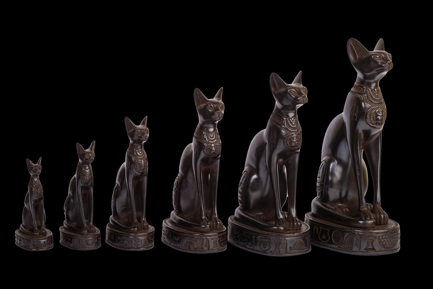 Group of six Statues of Egyptian cat bastet made of polystone