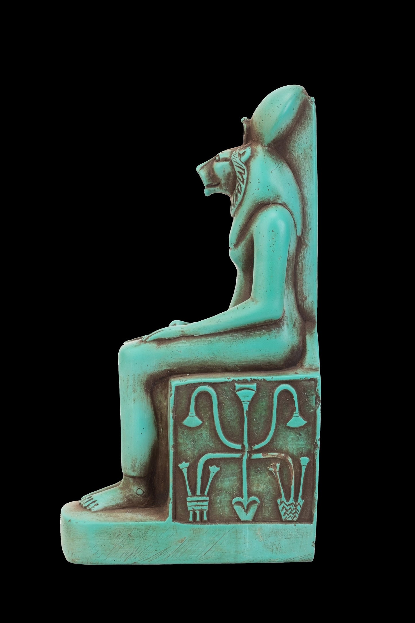 Seated statue of Sekhmet made of heavy stone green