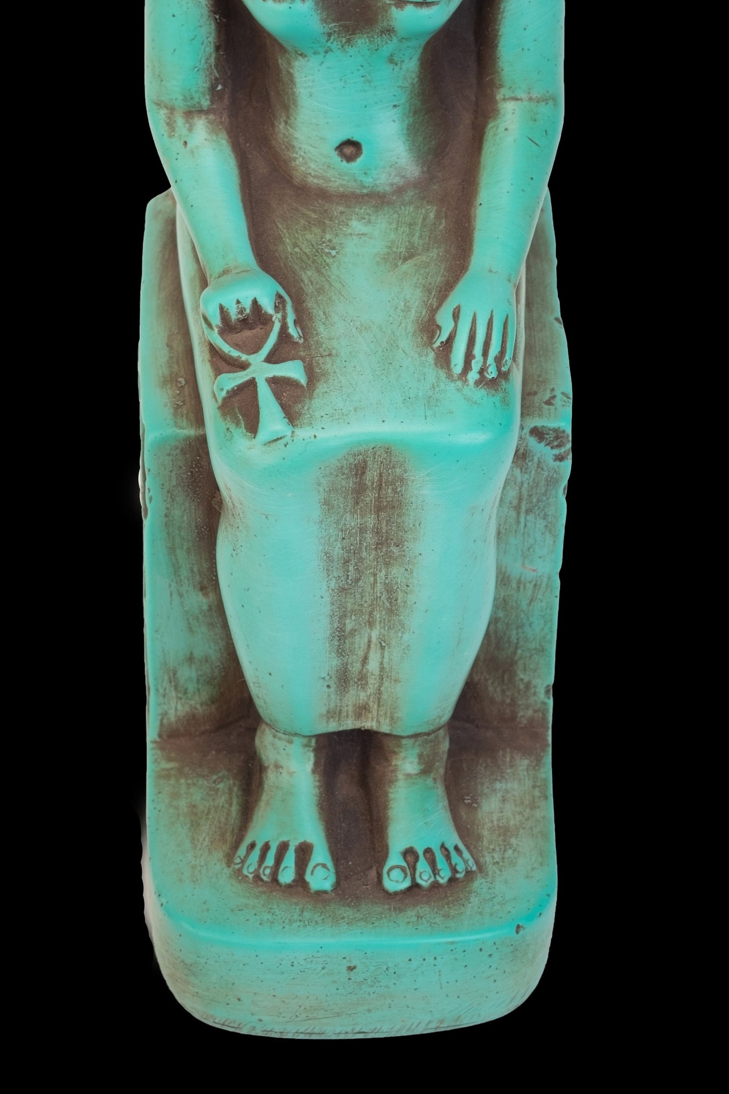 Seated statue of Sekhmet made of heavy stone green