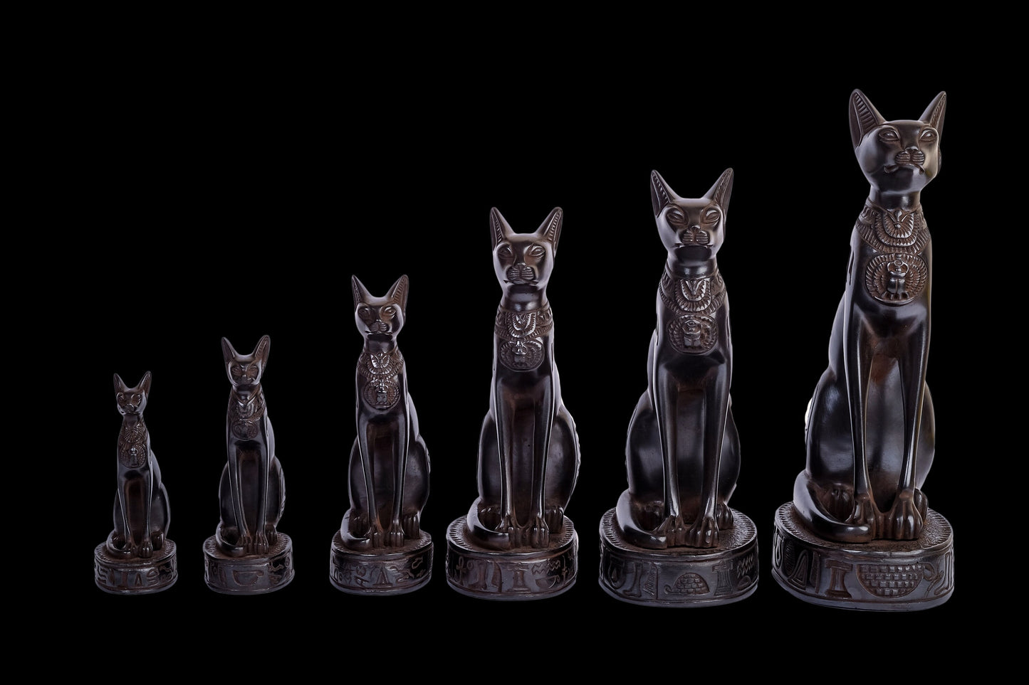 Group of six Statues of Egyptian cat bastet made of polystone