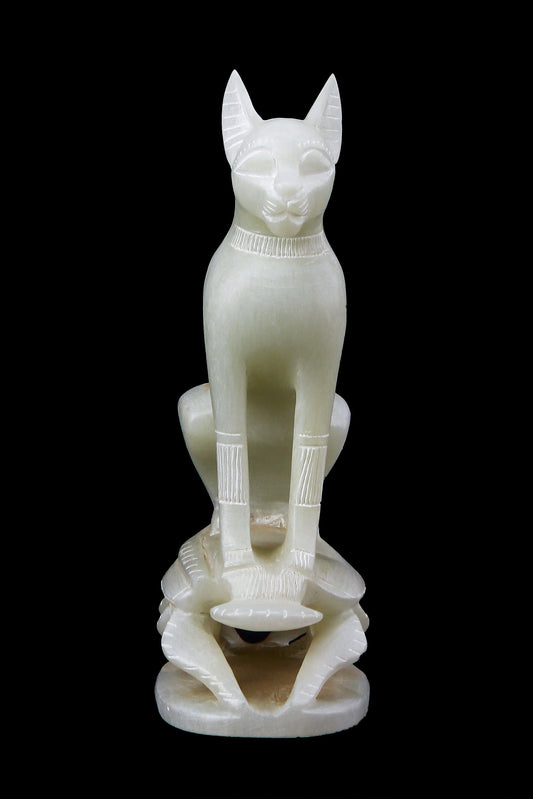 Ancient Egyptian statue of goddess Bastet cat standing on a Scarab hand carved Soap stone made in Egypt