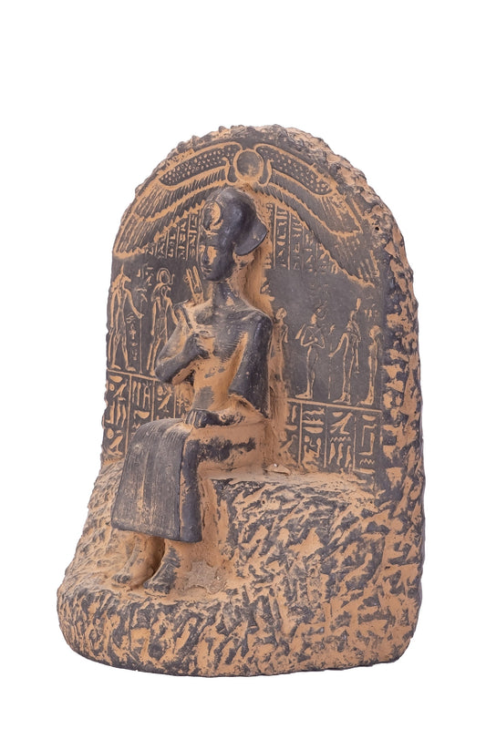 Ancient Egyptian statue of Pharaoh king Ramesses II seated on the throne carved with ancient Egyptian hieroglyphics, great court