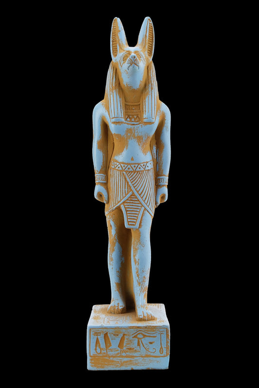 A unique ancient Egyptian statue of Anubis Jackal Symbol of afterlife and mummification standing with jackal head and human body