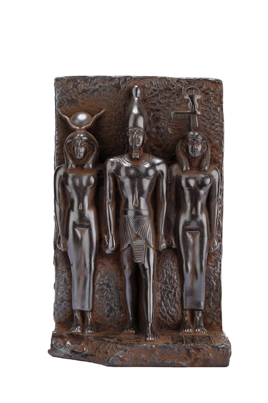 The triads of Menkaure pharaoh, stands between the goddess Hathor is on his right and goddess (bat) is on his left black heavy stone