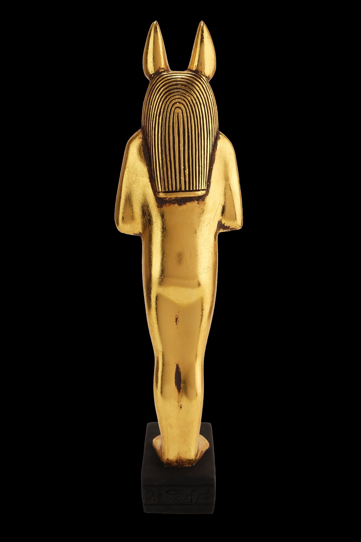 Aancient Egyptian statue of Anubis Jackal God of afterlife and mummification standing in form mummy with Jackal head Gold leaf hand painted