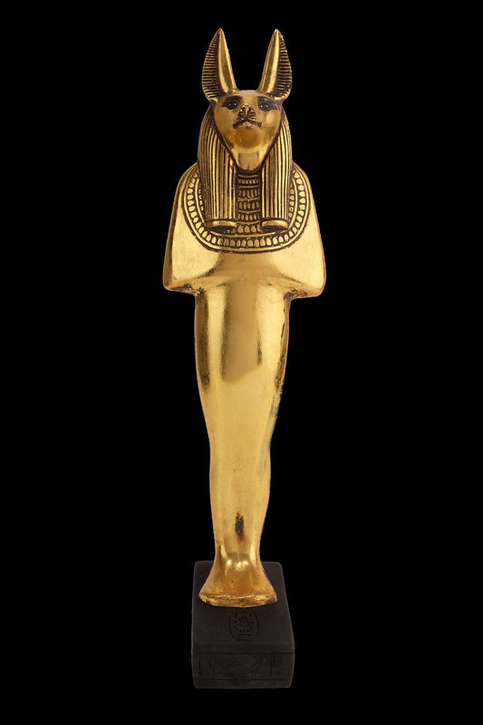 Aancient Egyptian statue of Anubis Jackal God of afterlife and mummification standing in form mummy with Jackal head Gold leaf hand painted