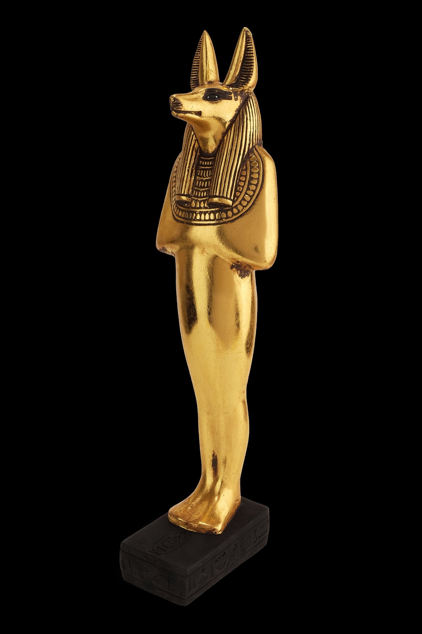 Aancient Egyptian statue of Anubis Jackal God of afterlife and mummification standing in form mummy with Jackal head Gold leaf hand painted