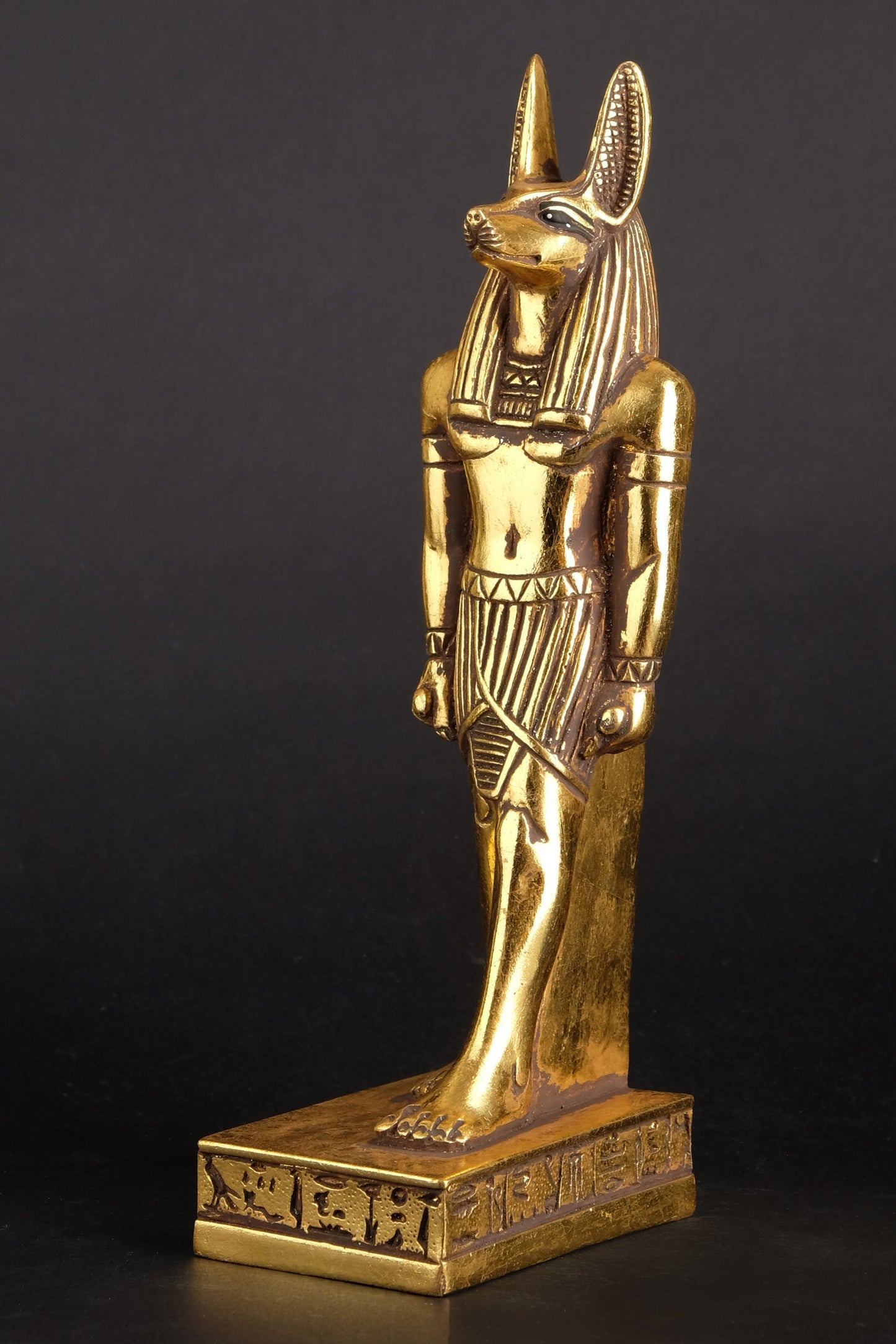 A unique ancient Egyptian statue of Anubis Jackal God of afterlife and mummification heavy stone Gold leaf hand painted made in Egypt