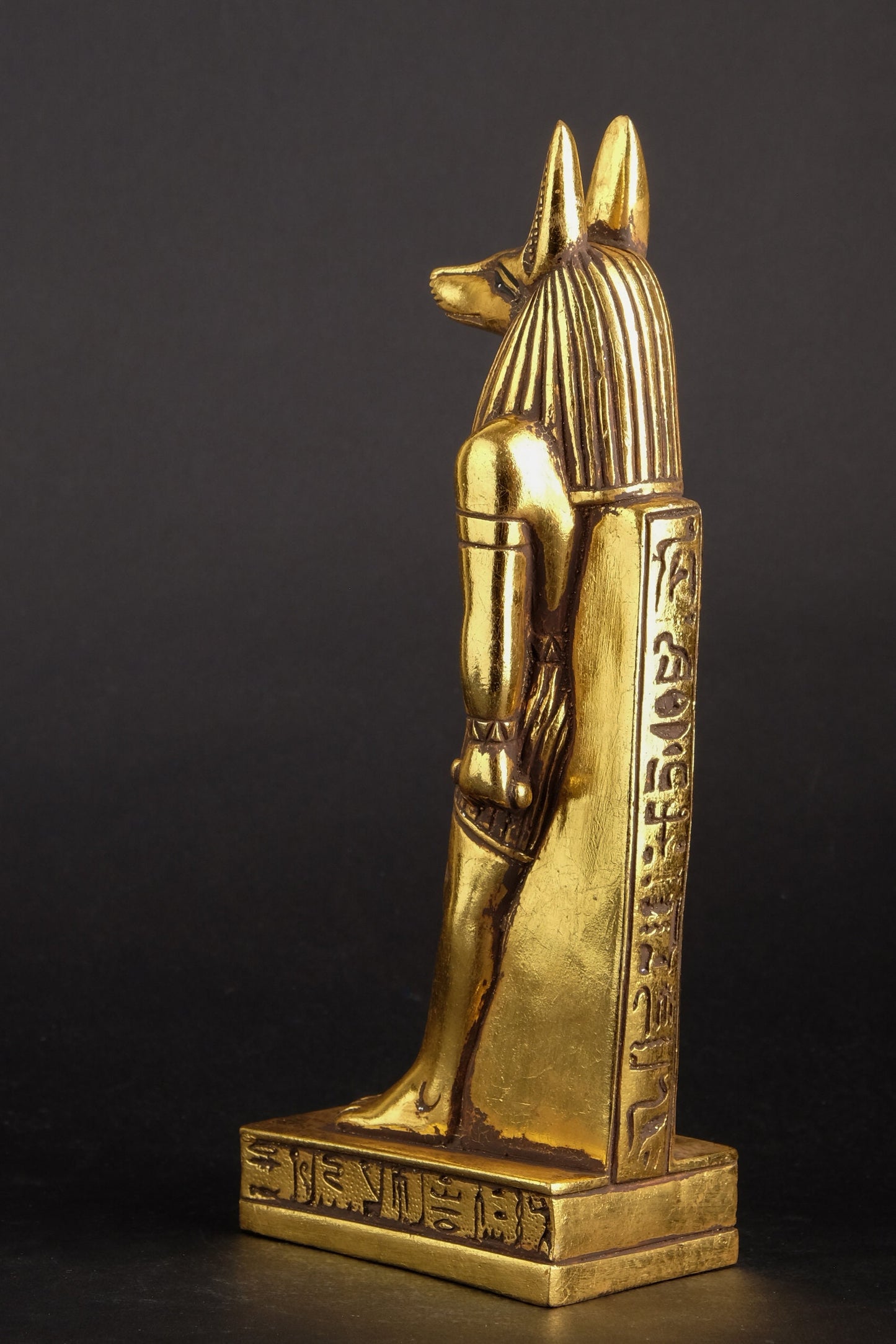 A unique ancient Egyptian statue of Anubis Jackal God of afterlife and mummification heavy stone Gold leaf hand painted made in Egypt