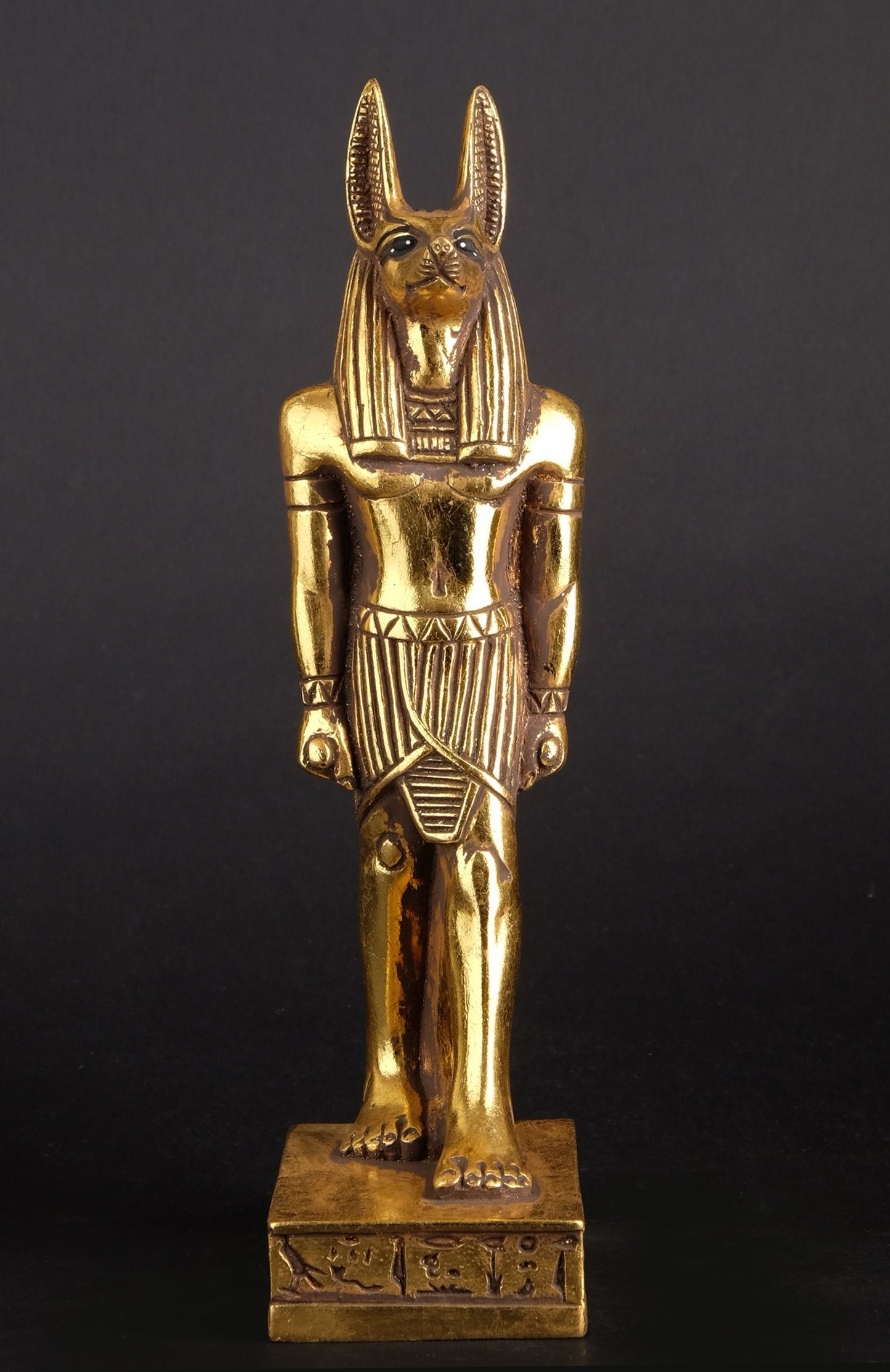 A unique ancient Egyptian statue of Anubis Jackal God of afterlife and mummification heavy stone Gold leaf hand painted made in Egypt