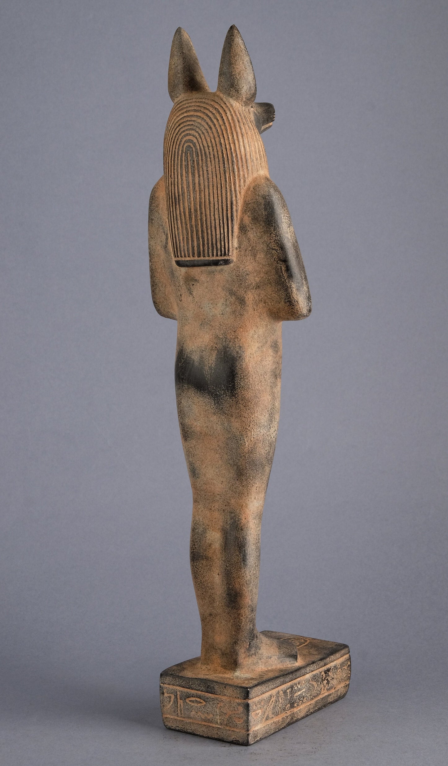 A unique ancient Egyptian statue of Anubis Jackal Symbol  of afterlife and mummification standing in form mummy with Jackel head