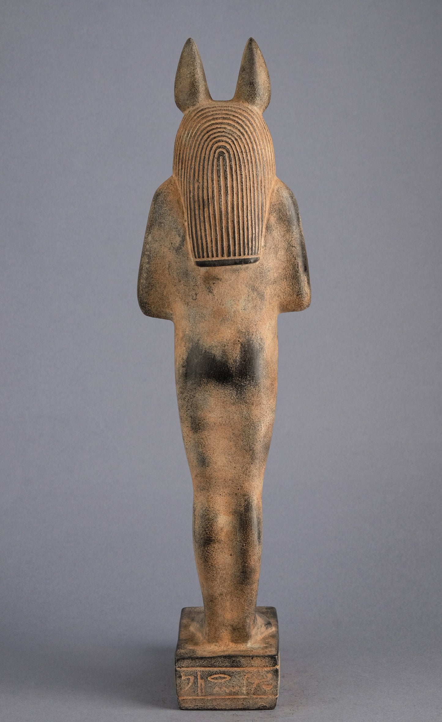 A unique ancient Egyptian statue of Anubis Jackal Symbol  of afterlife and mummification standing in form mummy with Jackel head