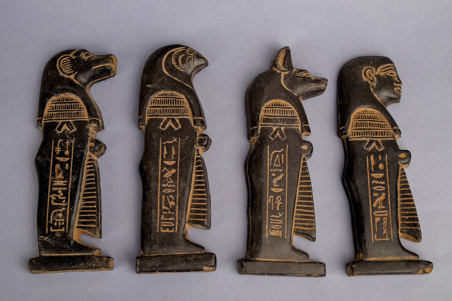 Amazing Four (Anubis - Isis - Baboon - Horus) The four gods holding the feather of Ma’at - made from Basalt stone - made in Egypt