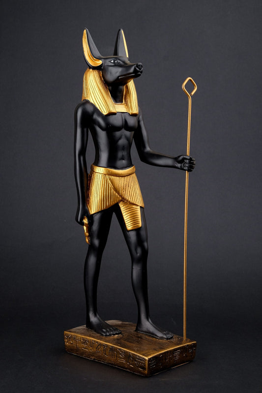 A unique ancient Egyptian statue of Anubis Jackal God of afterlife and mummification unique large gold and black hand painted